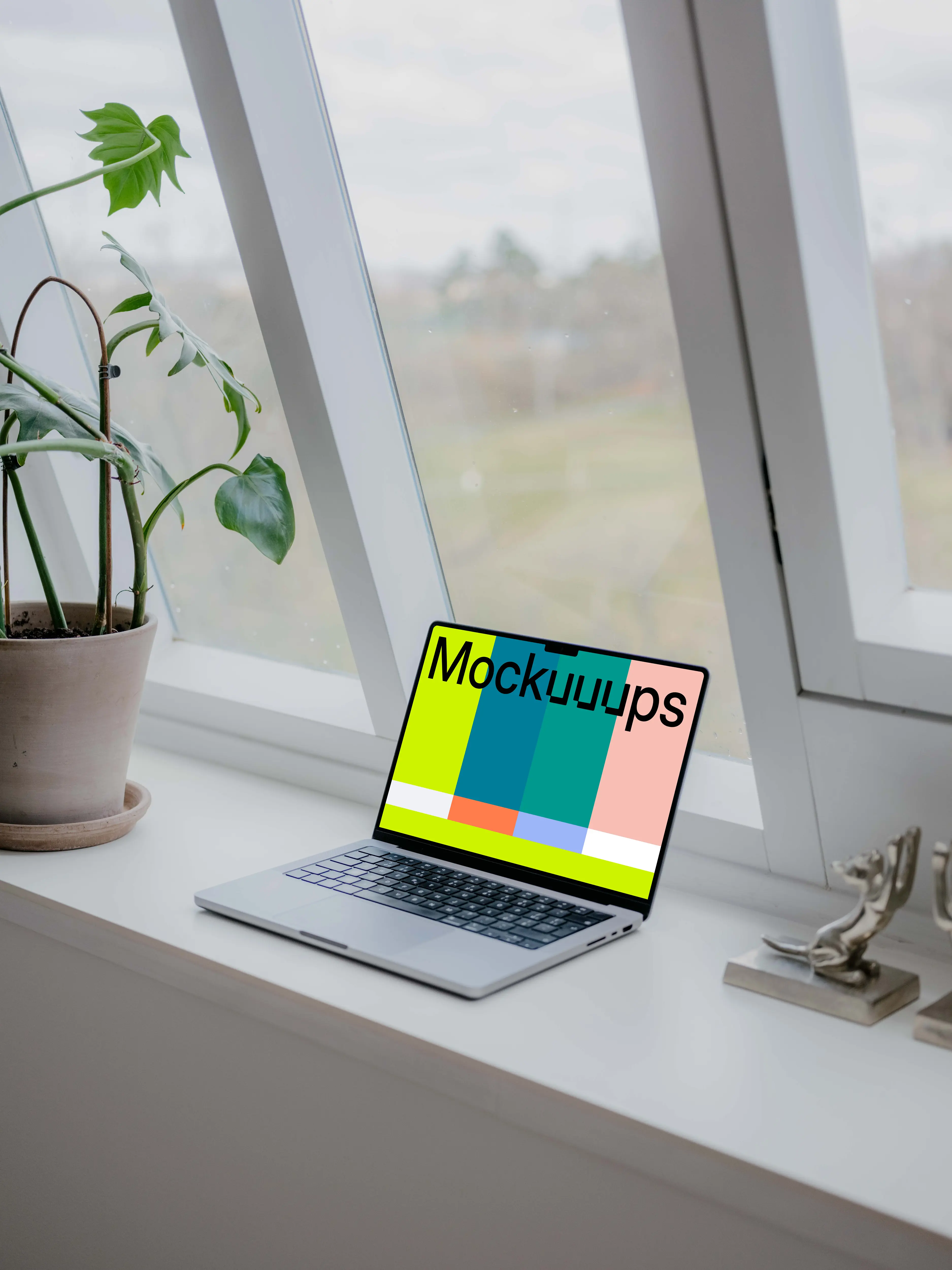 MacBook Pro mockup next to the window