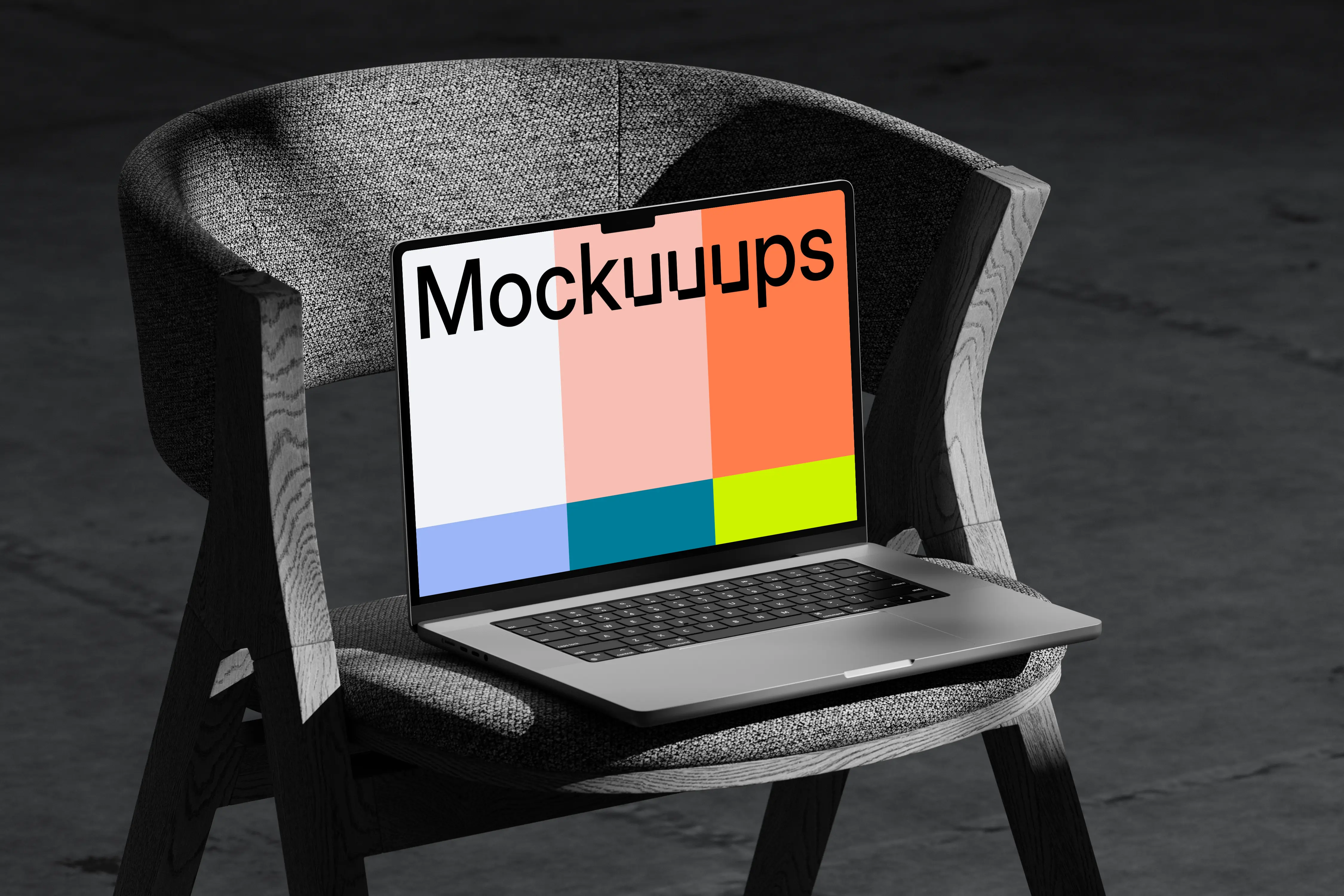 MacBook Pro mockup on a textured chair with dramatic shadows