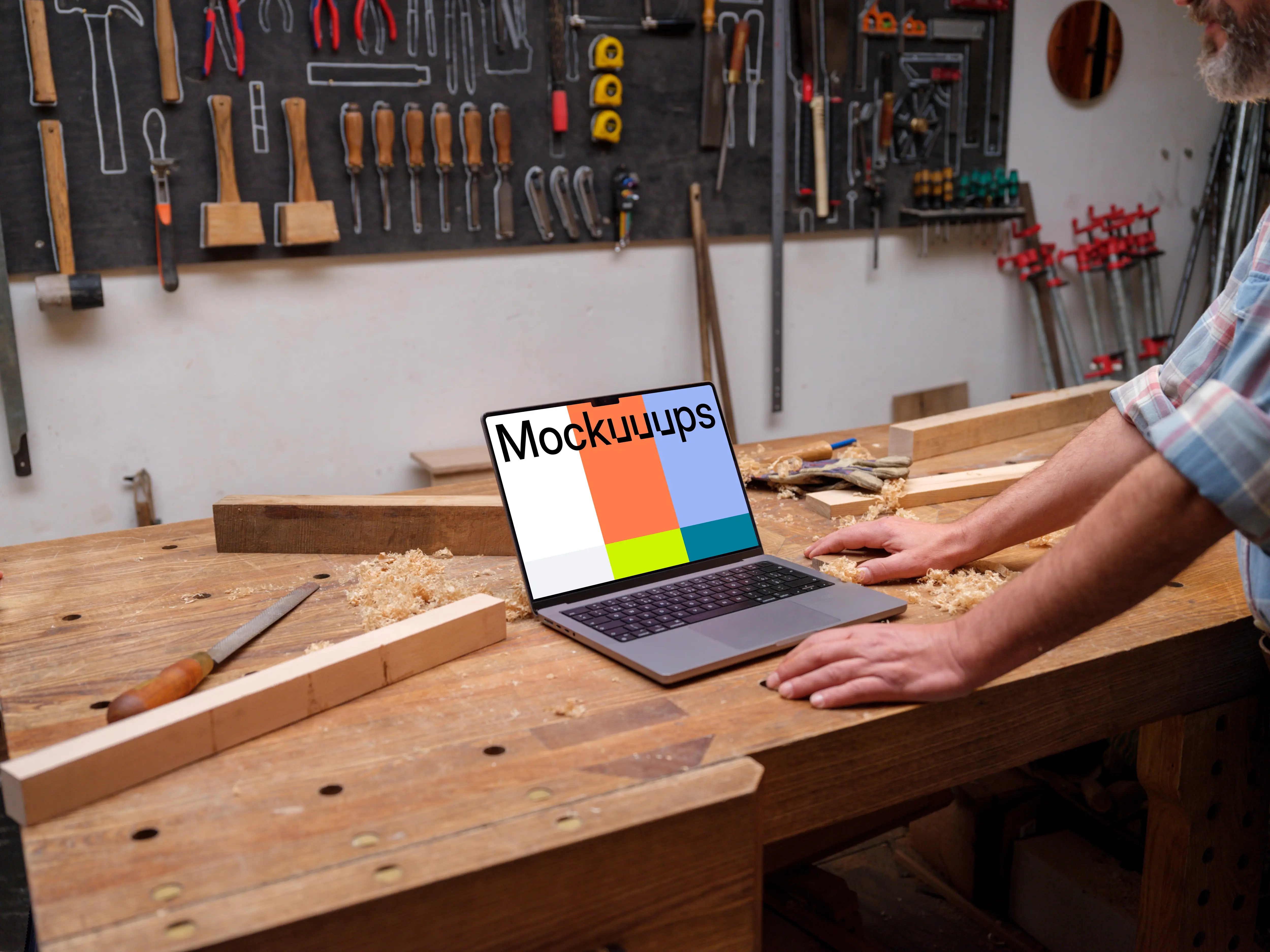MacBook Pro mockup on a wooden desk