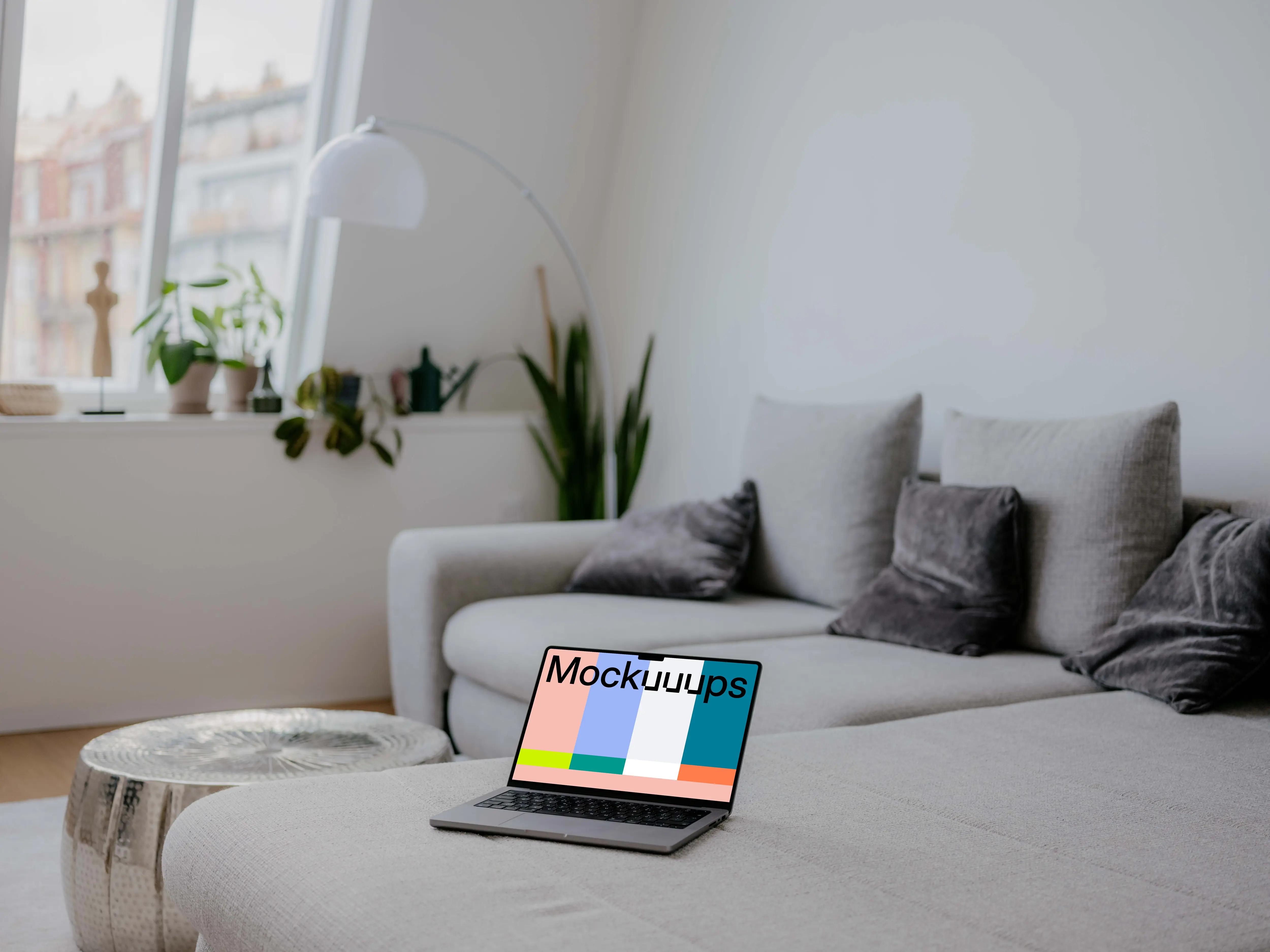 MacBook Pro mockup on the sofa