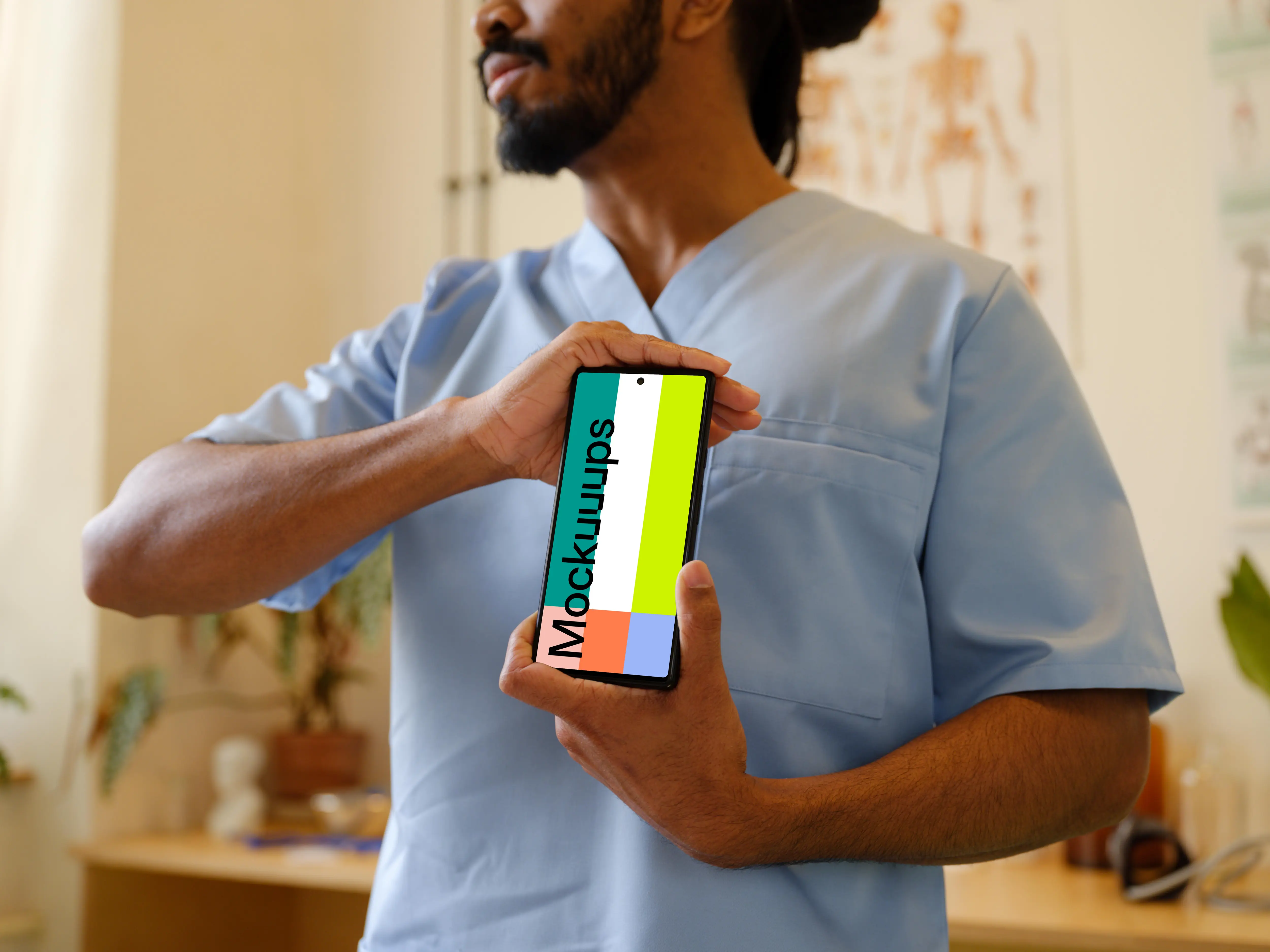 Male doctor holding a Google Pixel mockup