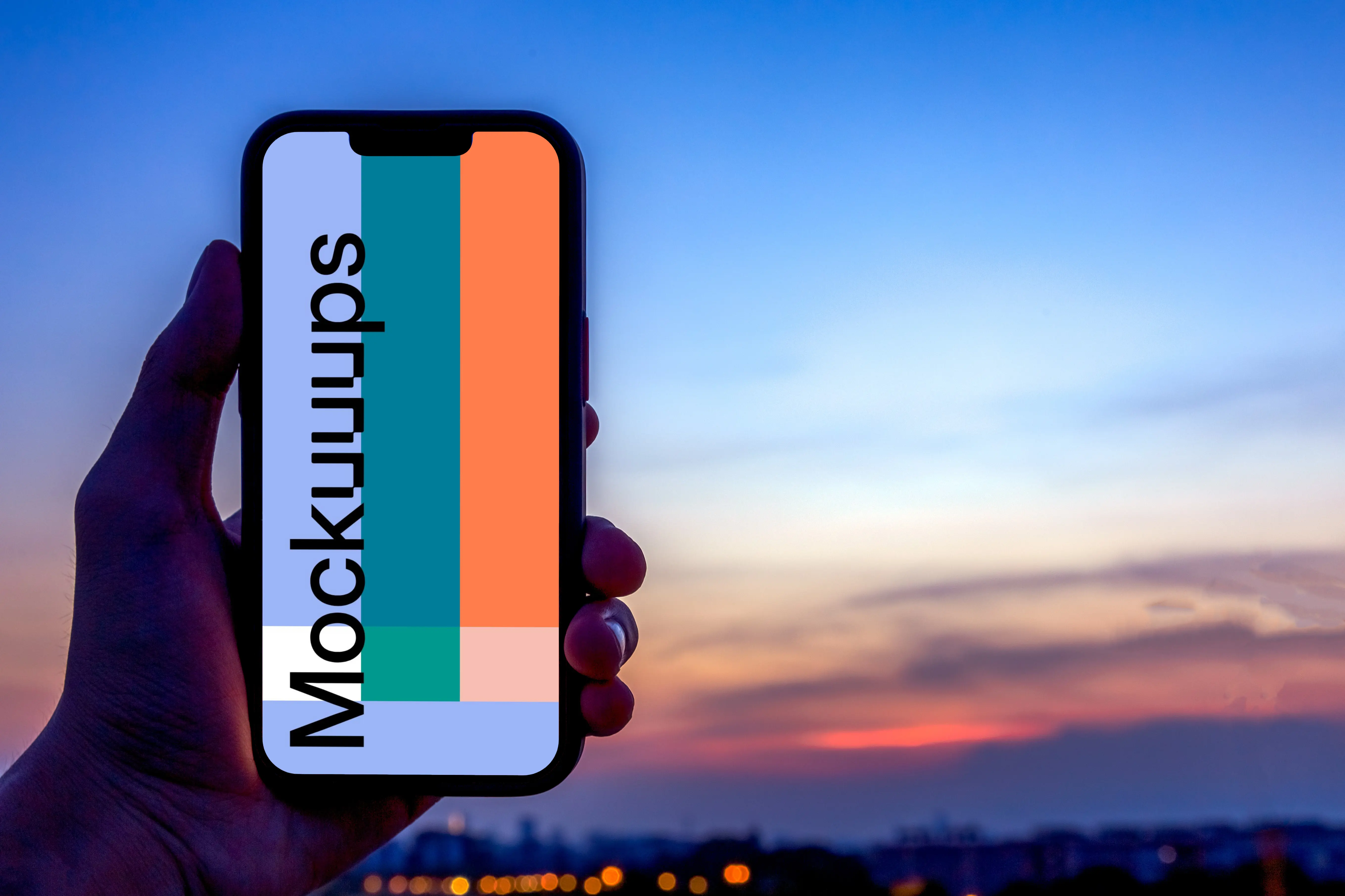 Male hand holding an iPhone 13 mockup