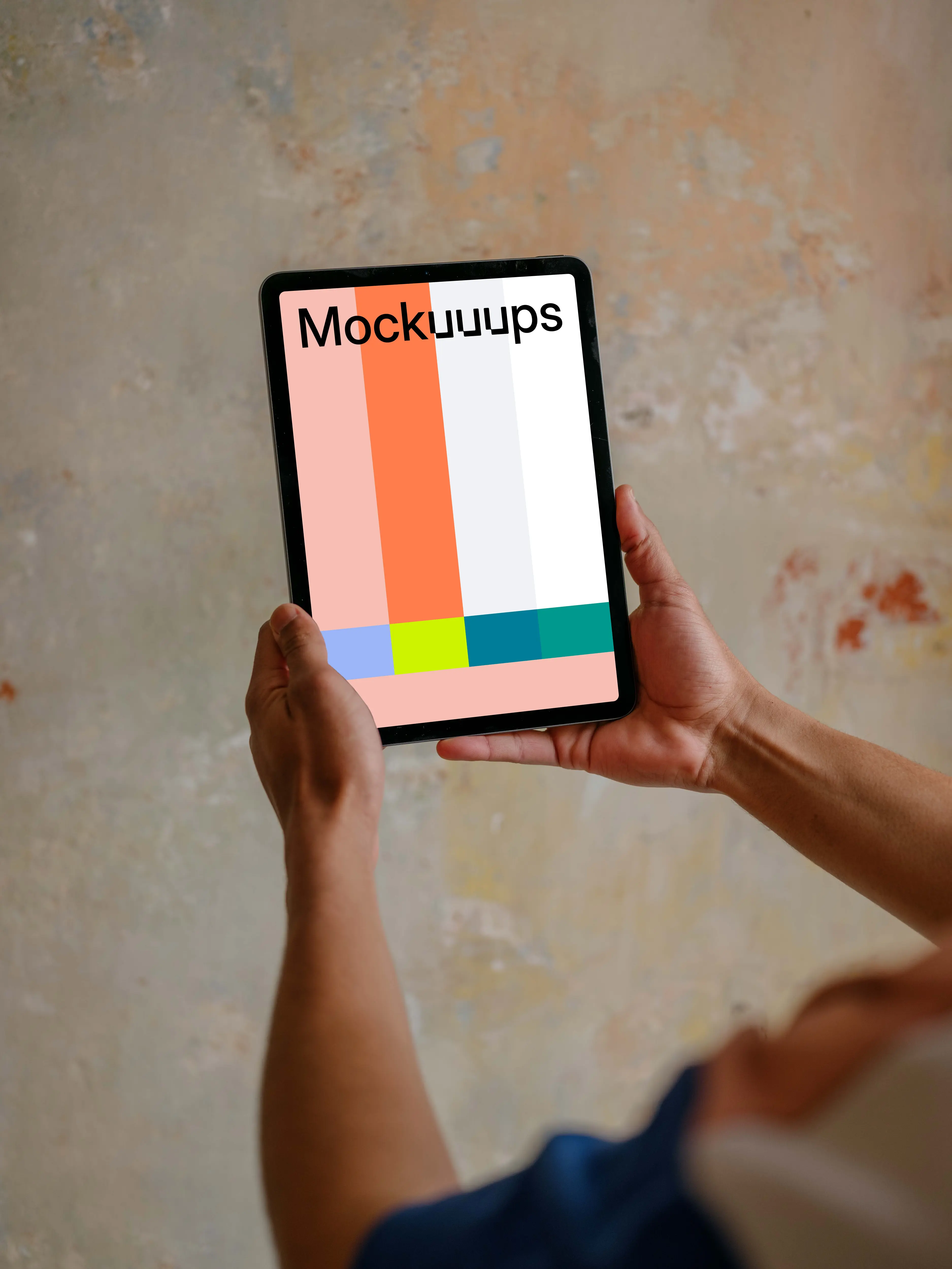 Male hands holding iPad Air mockup