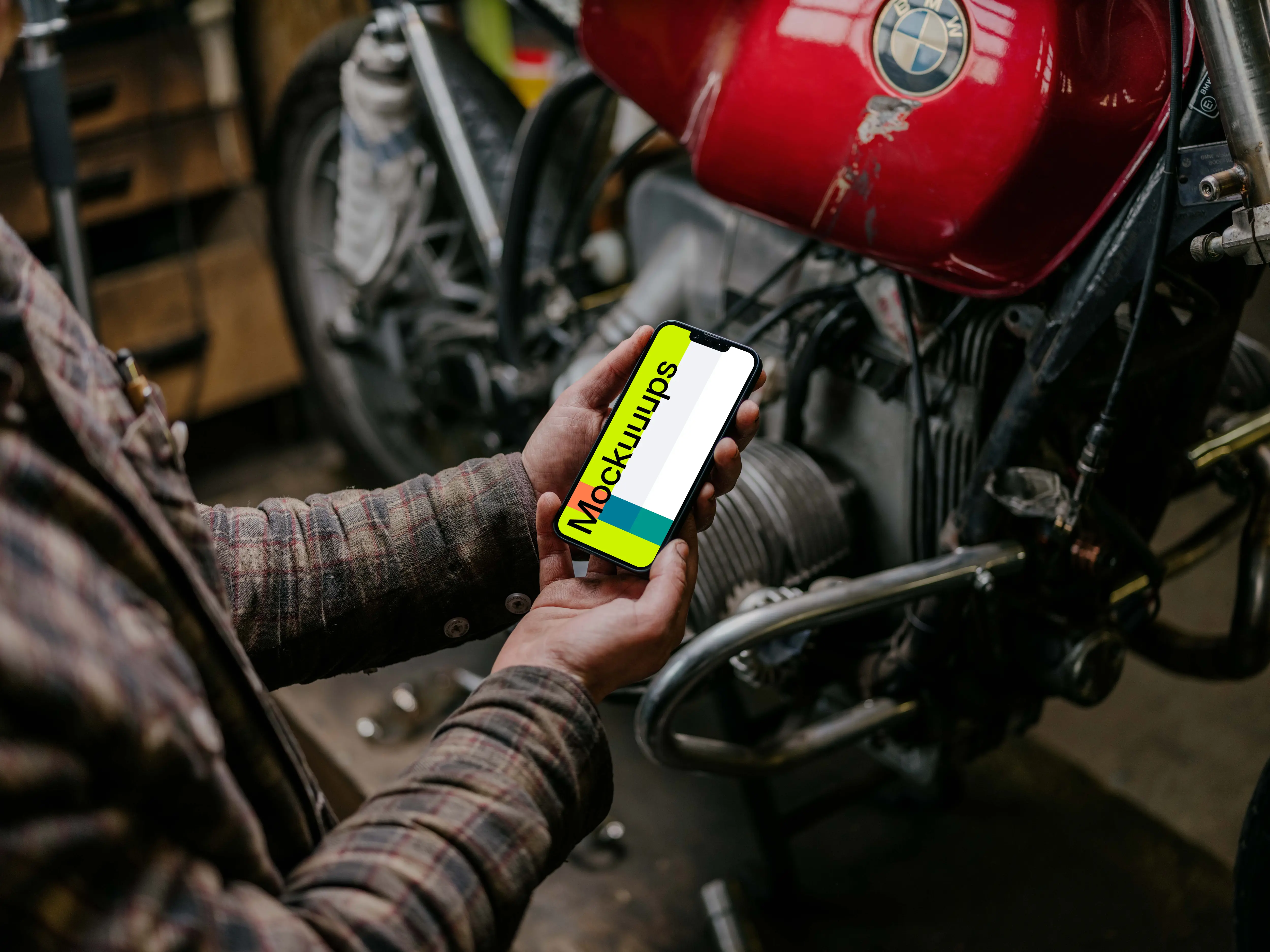 Man holding an iPhone 13 Pro mockup with both hands