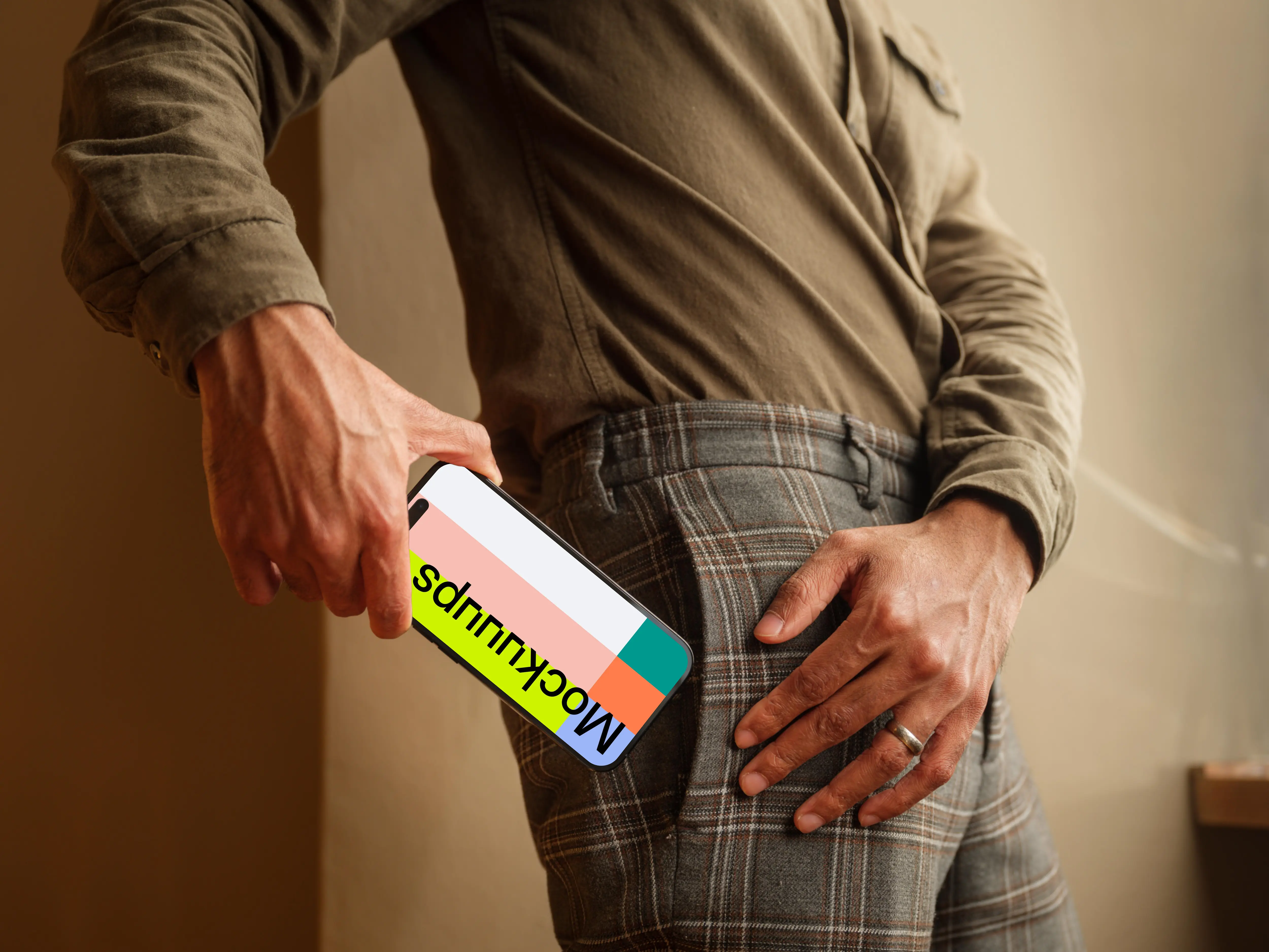 Man putting out of his pocket a iPhone mockup