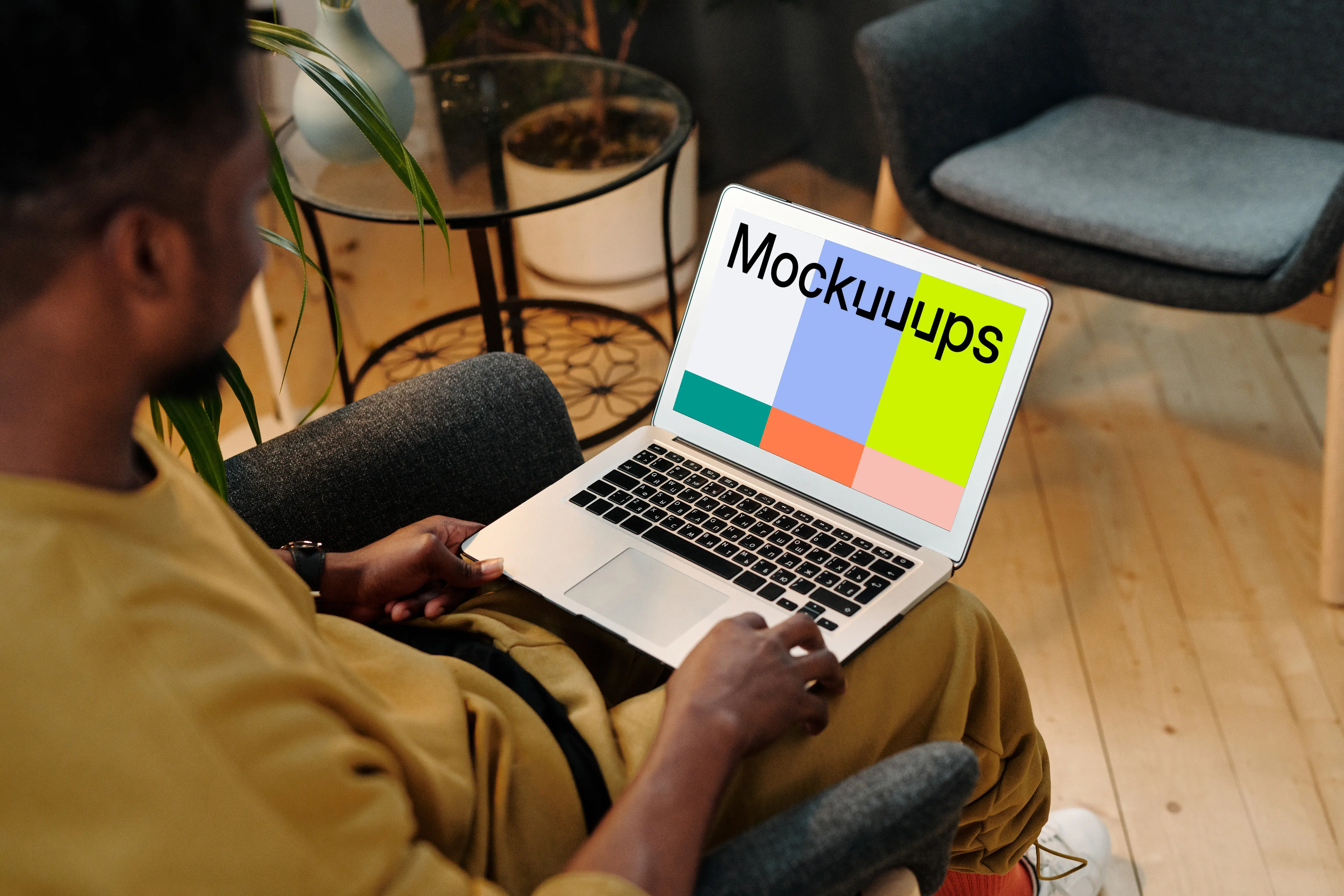 Man using a MacBook Air mockup