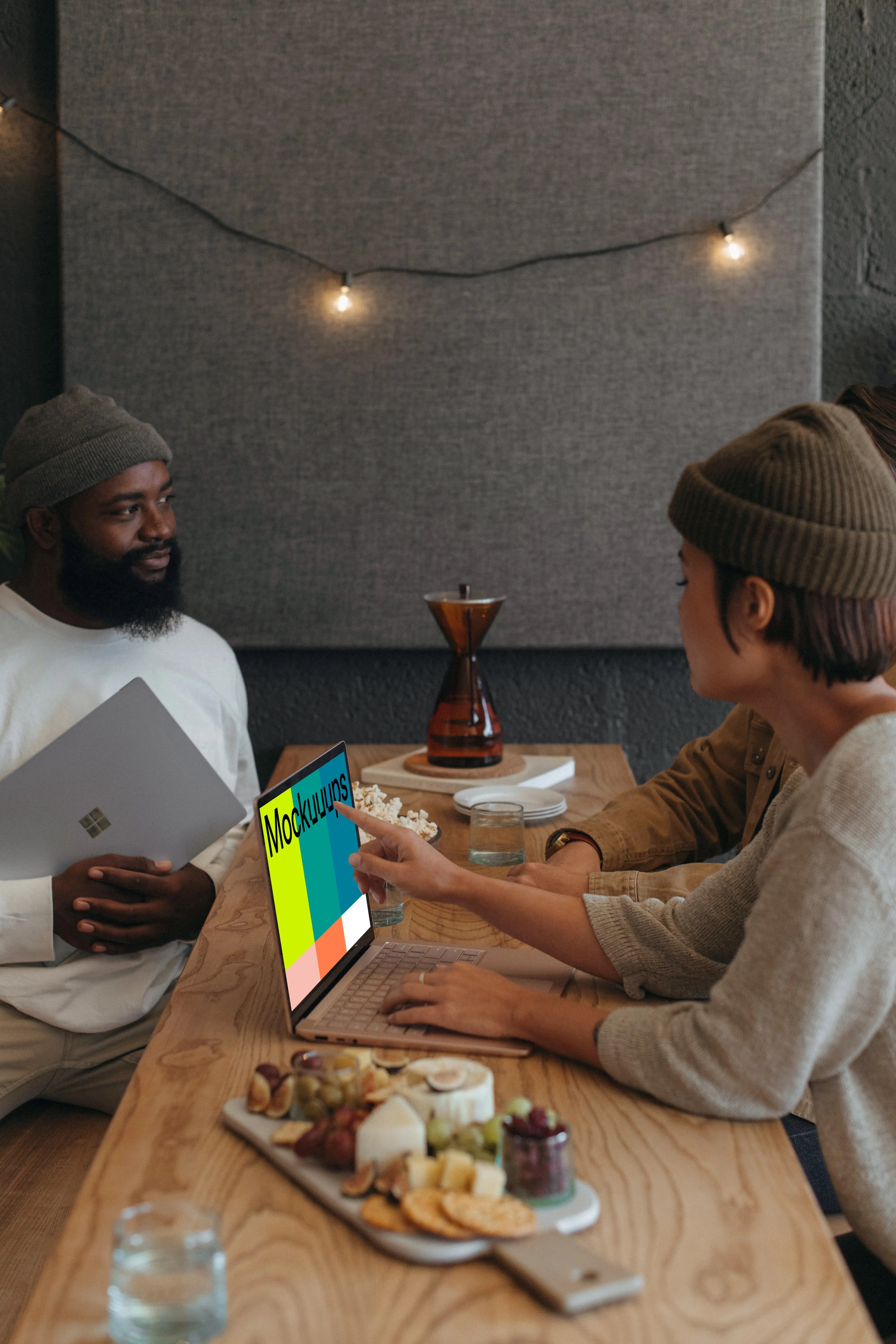 Microsoft Surface laptop mockup with multiple users