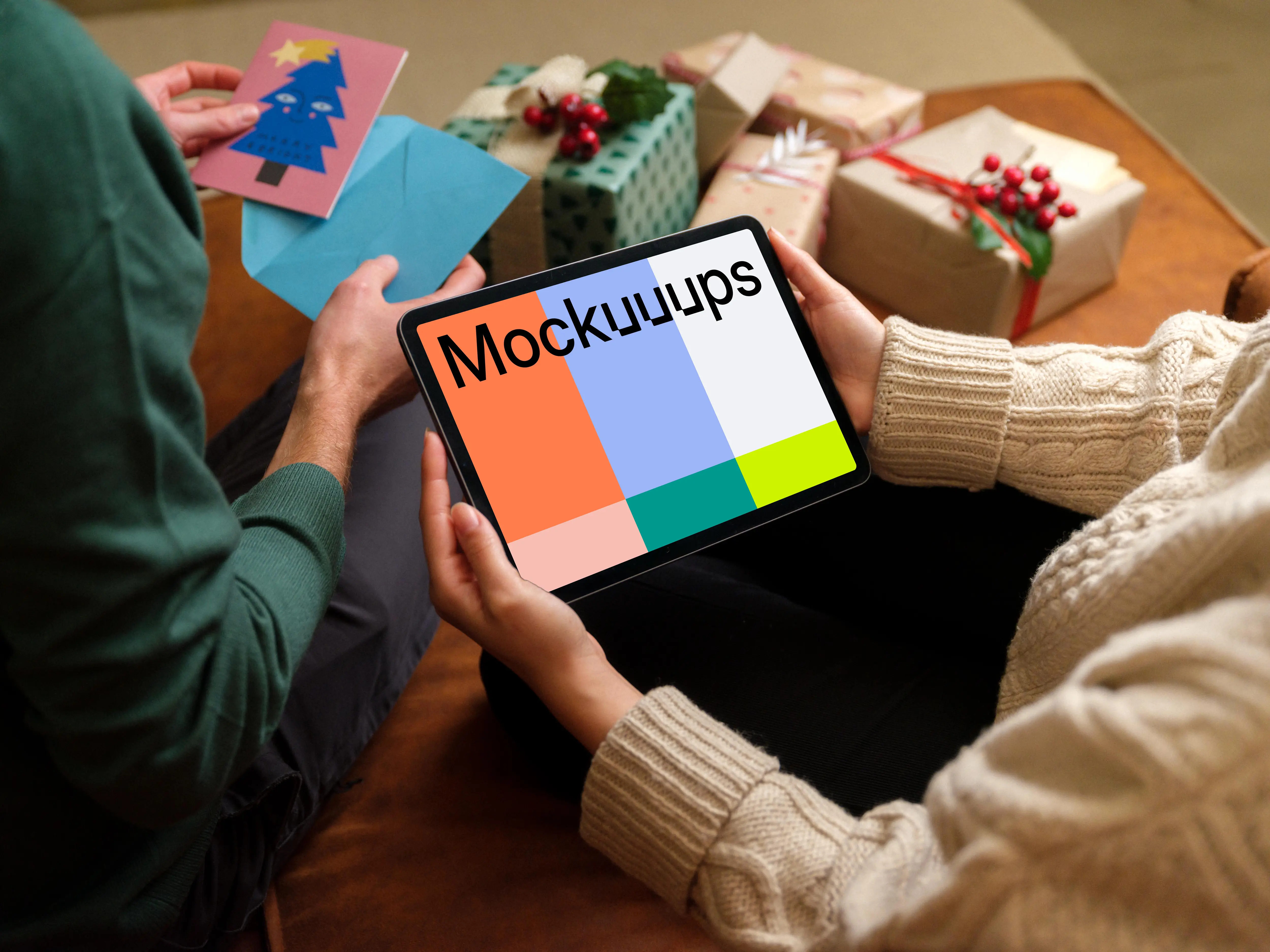 Mockup of a woman holding tablet with a Christmas styling