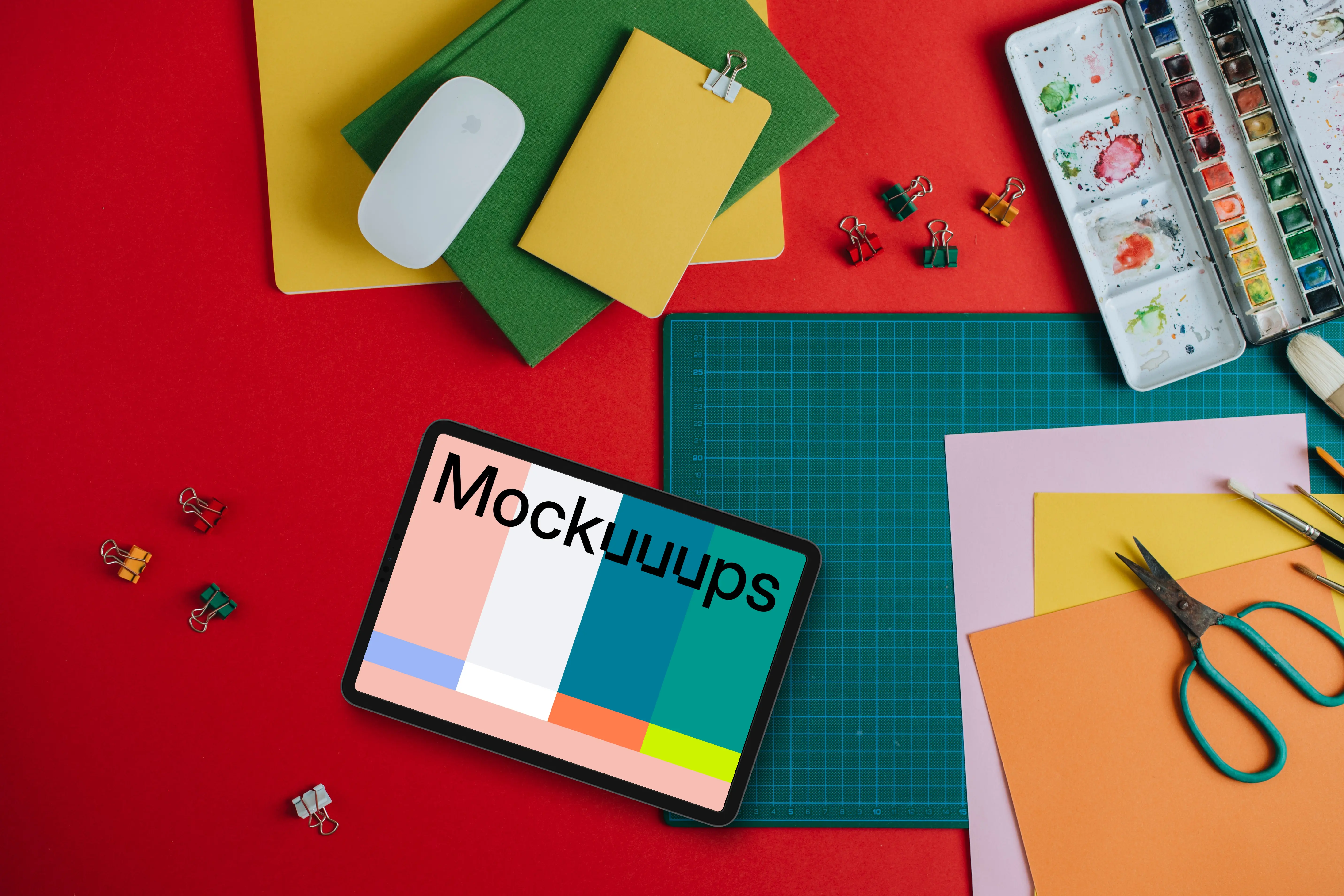 Mockup of tablet surrounded by school equipment