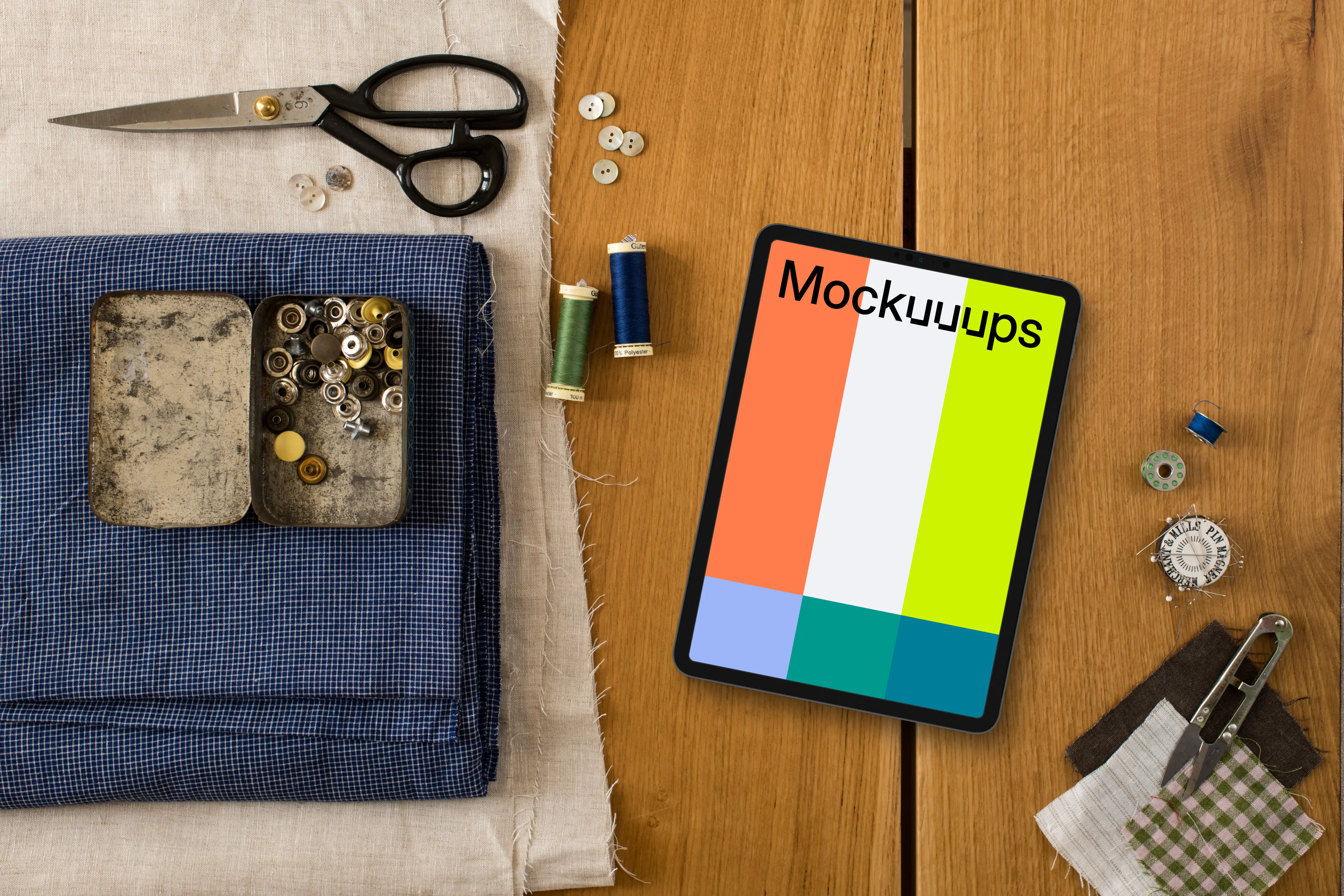 Mockup of tablet with sewing accessories