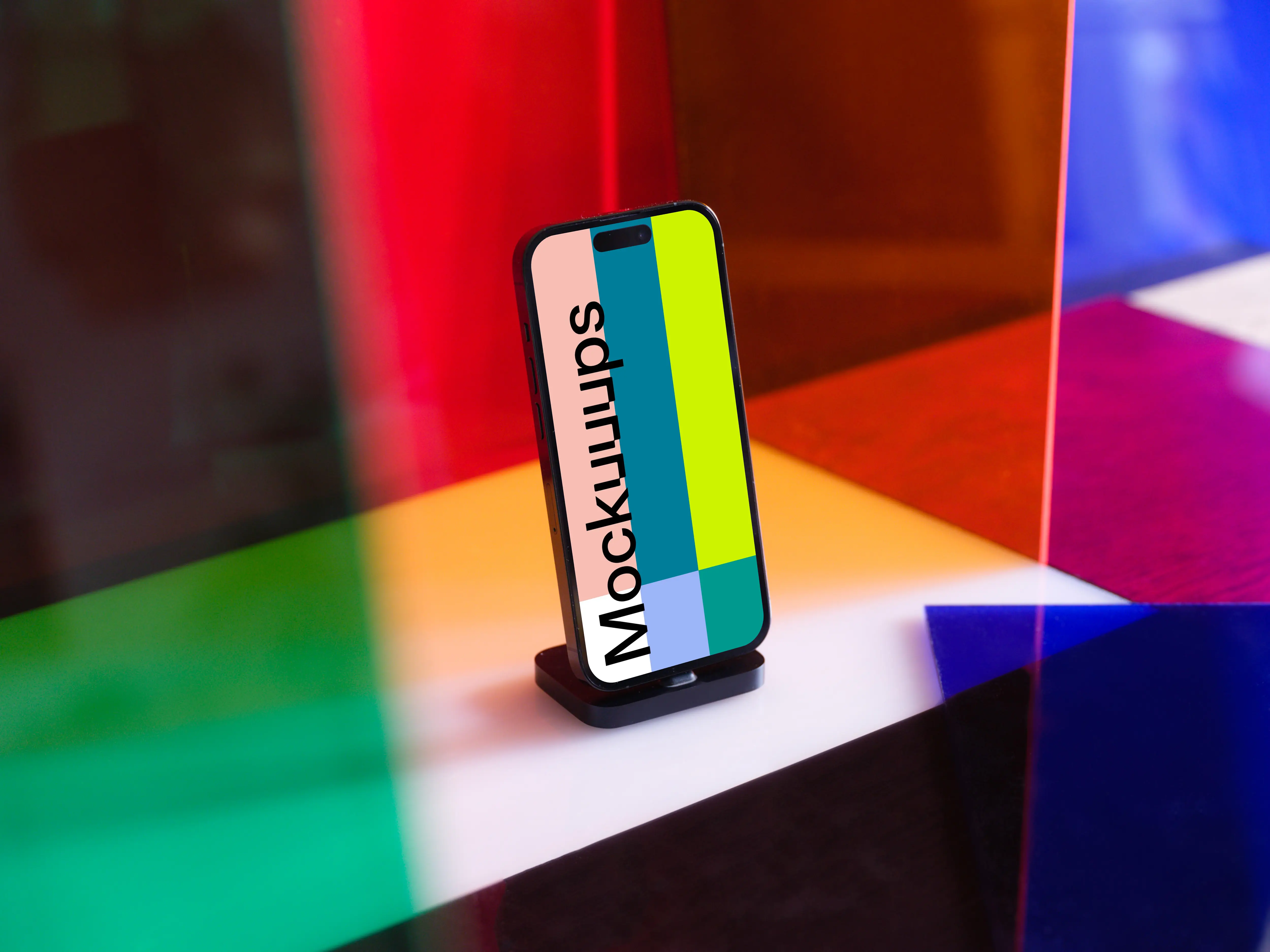 Multicolored background behind a iPhone 14 Pro mockup