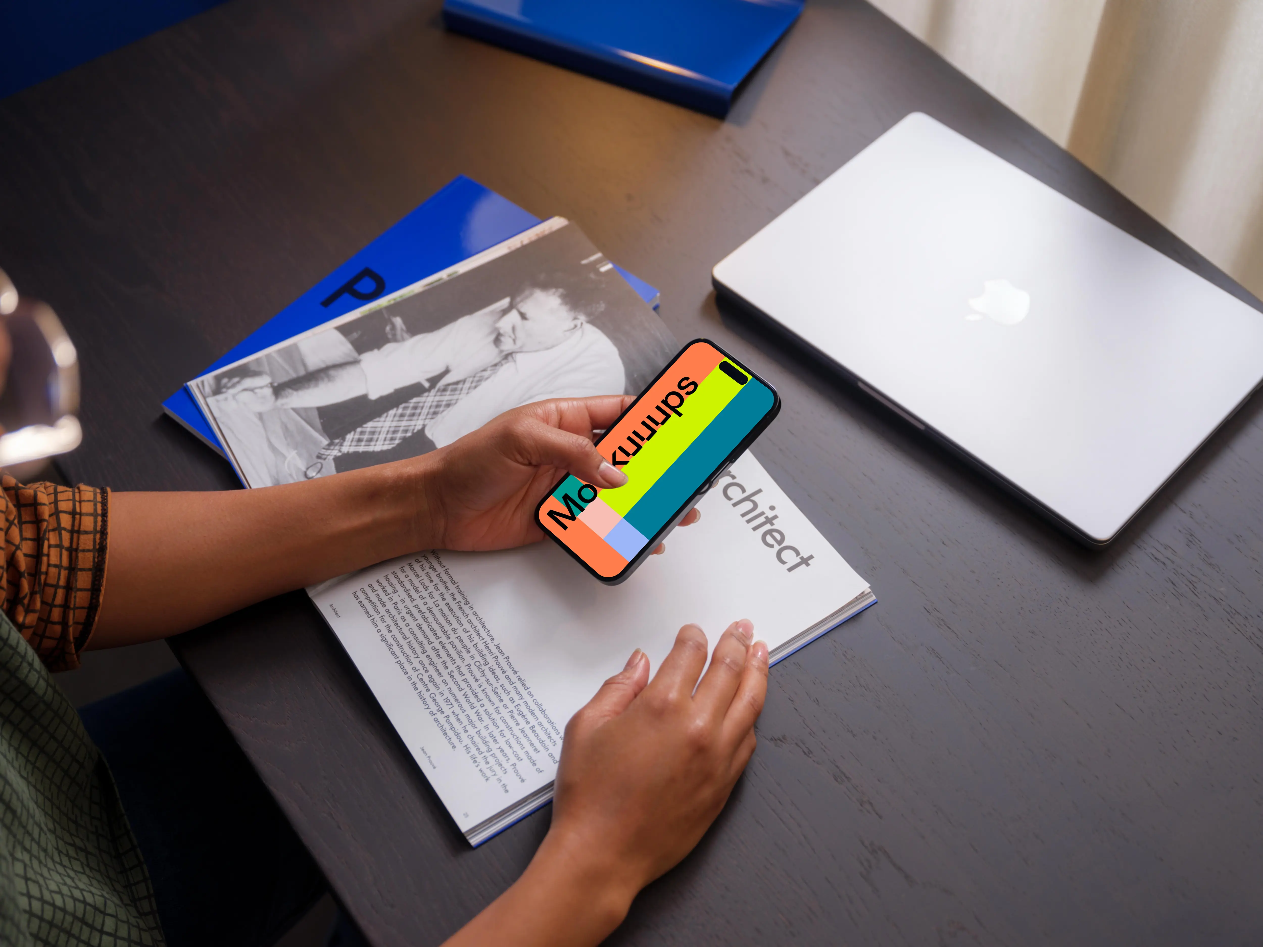 Person typing on a iPhone 14 Pro mockup