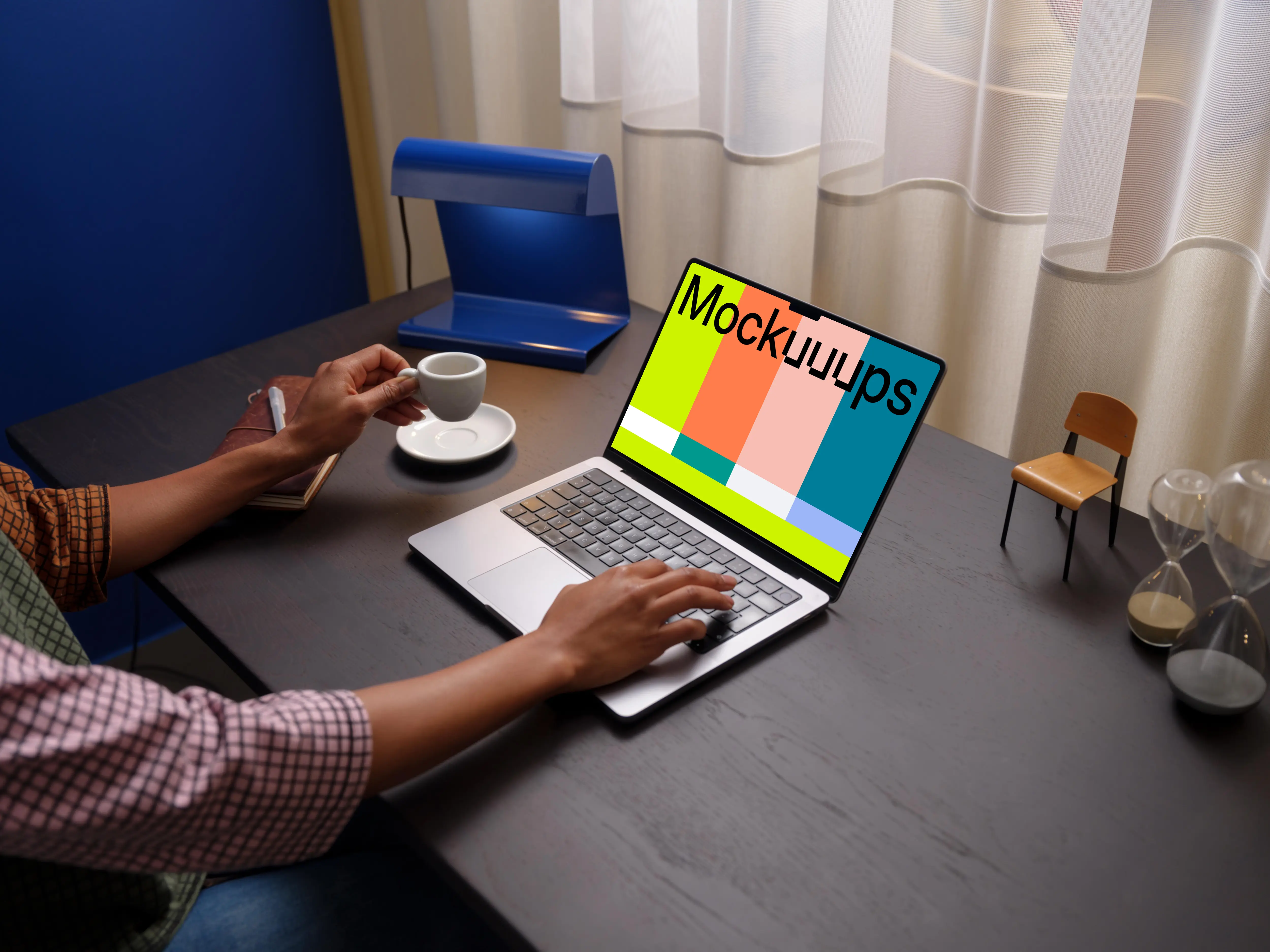 Person working on a MacBook Pro mockup