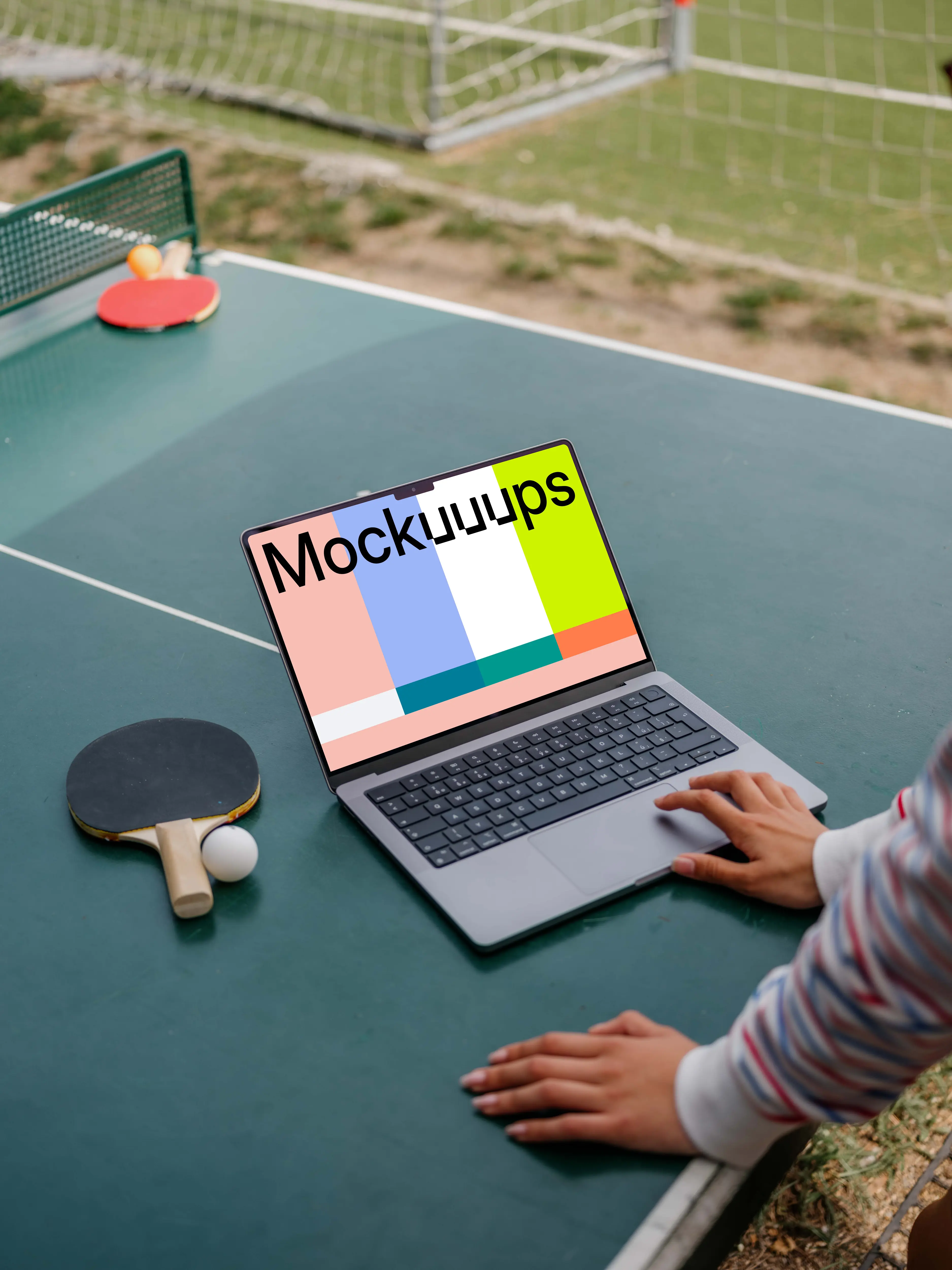 Ping-pong player checking on a MacBook Pro mockup