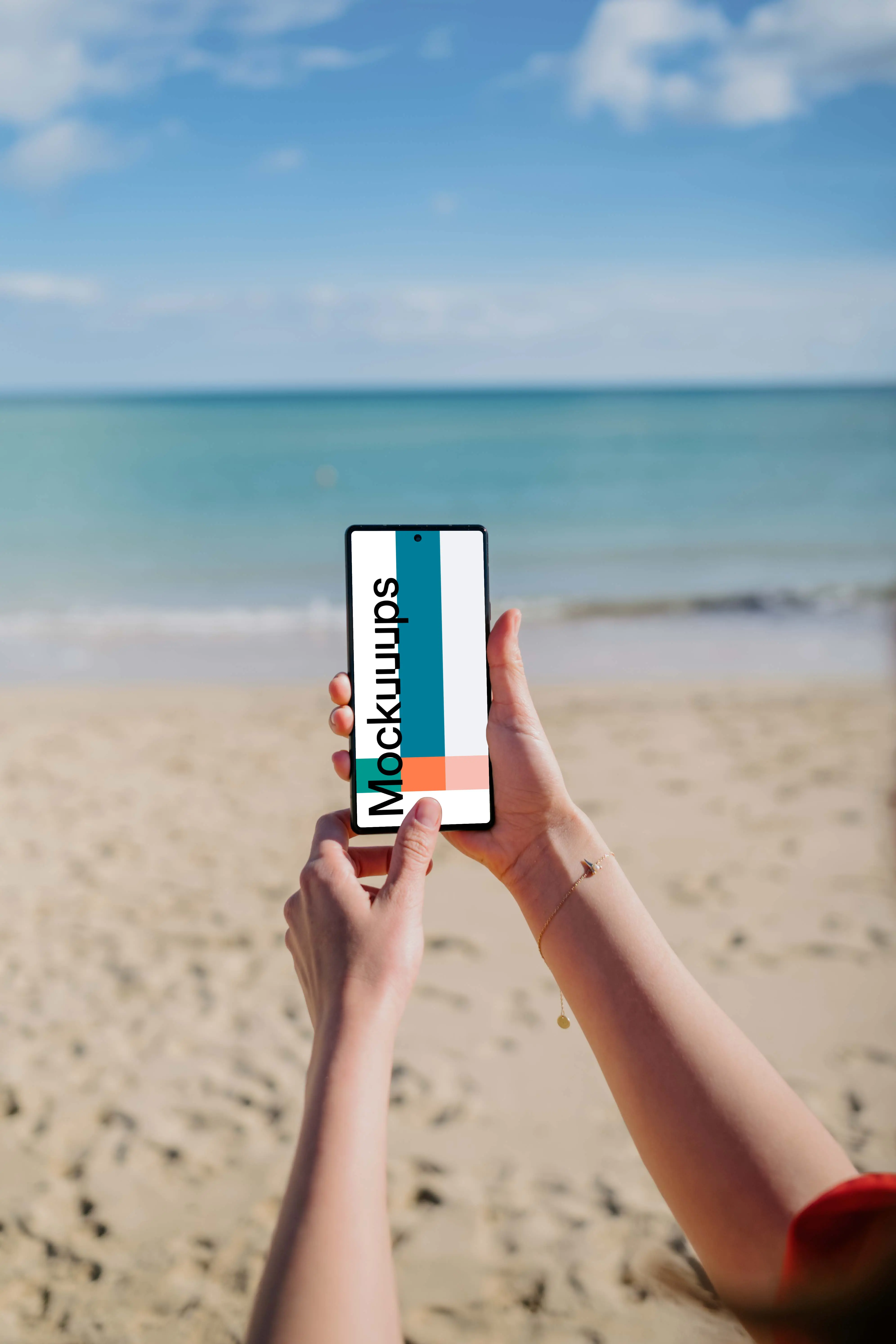 Pixel 6 mockup held by a user on a beach