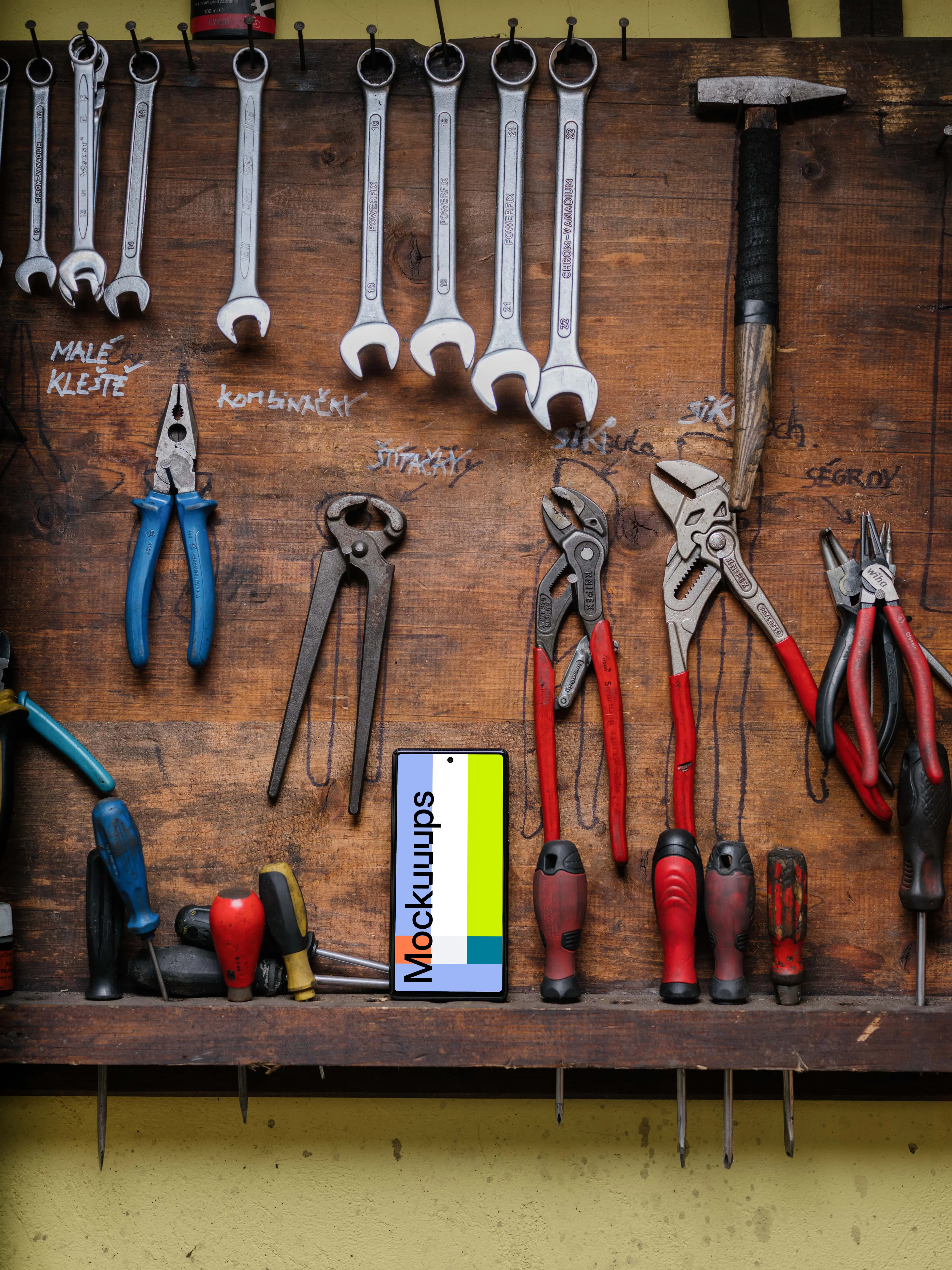 Pixel 6 mockup placed next to some pliers