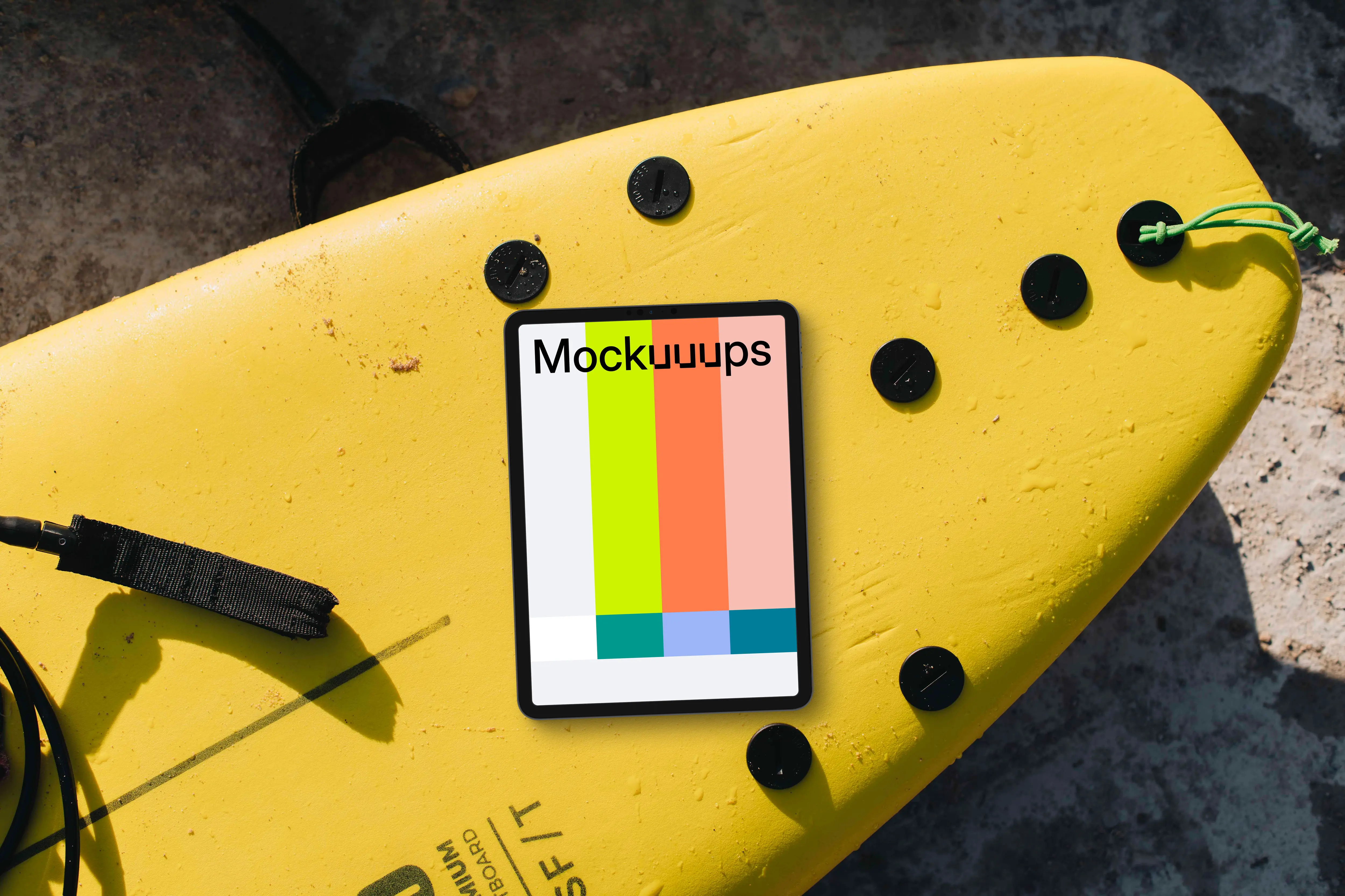 Surfboard with the tablet mockup on top of it