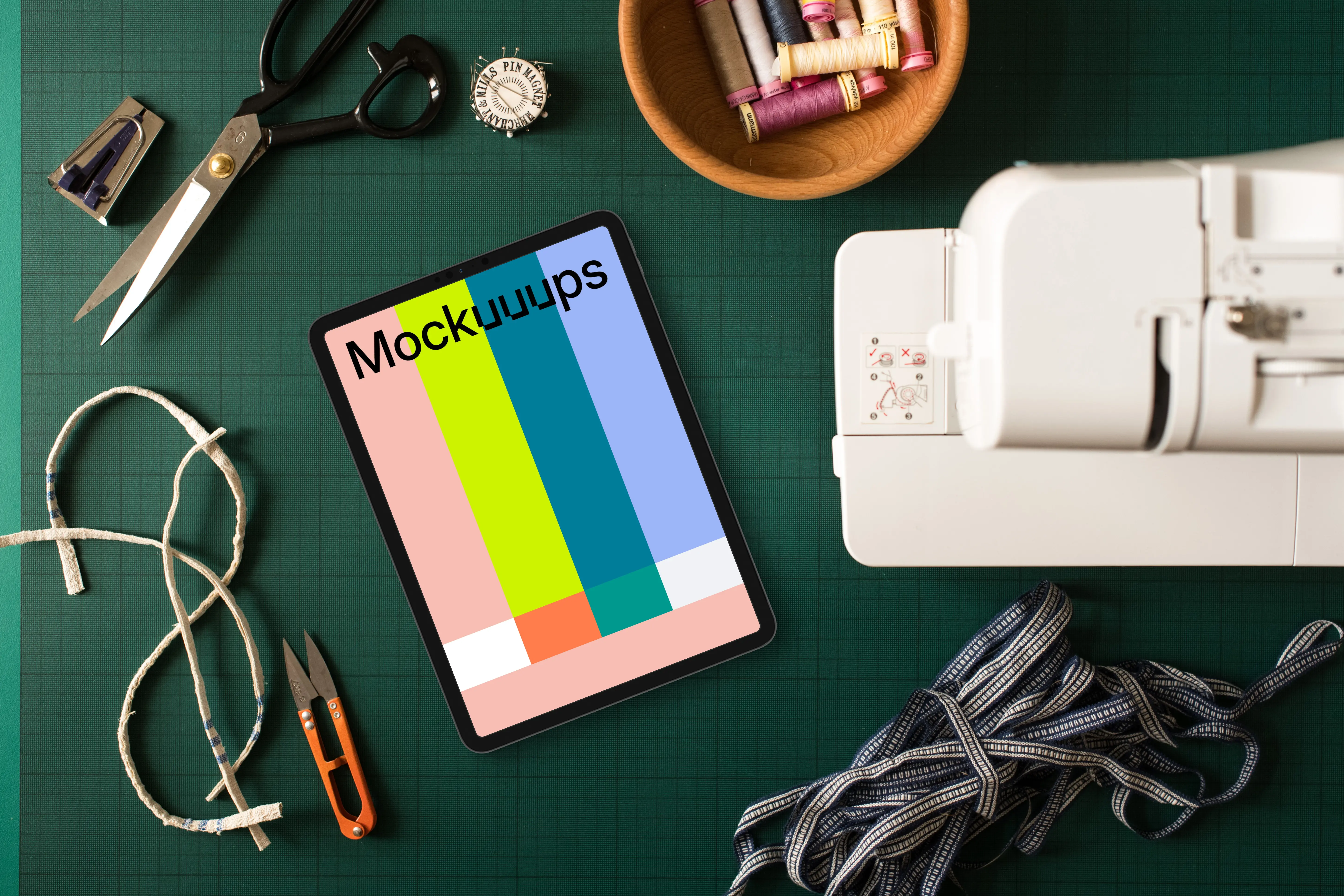 Tablet mockup on green work mat