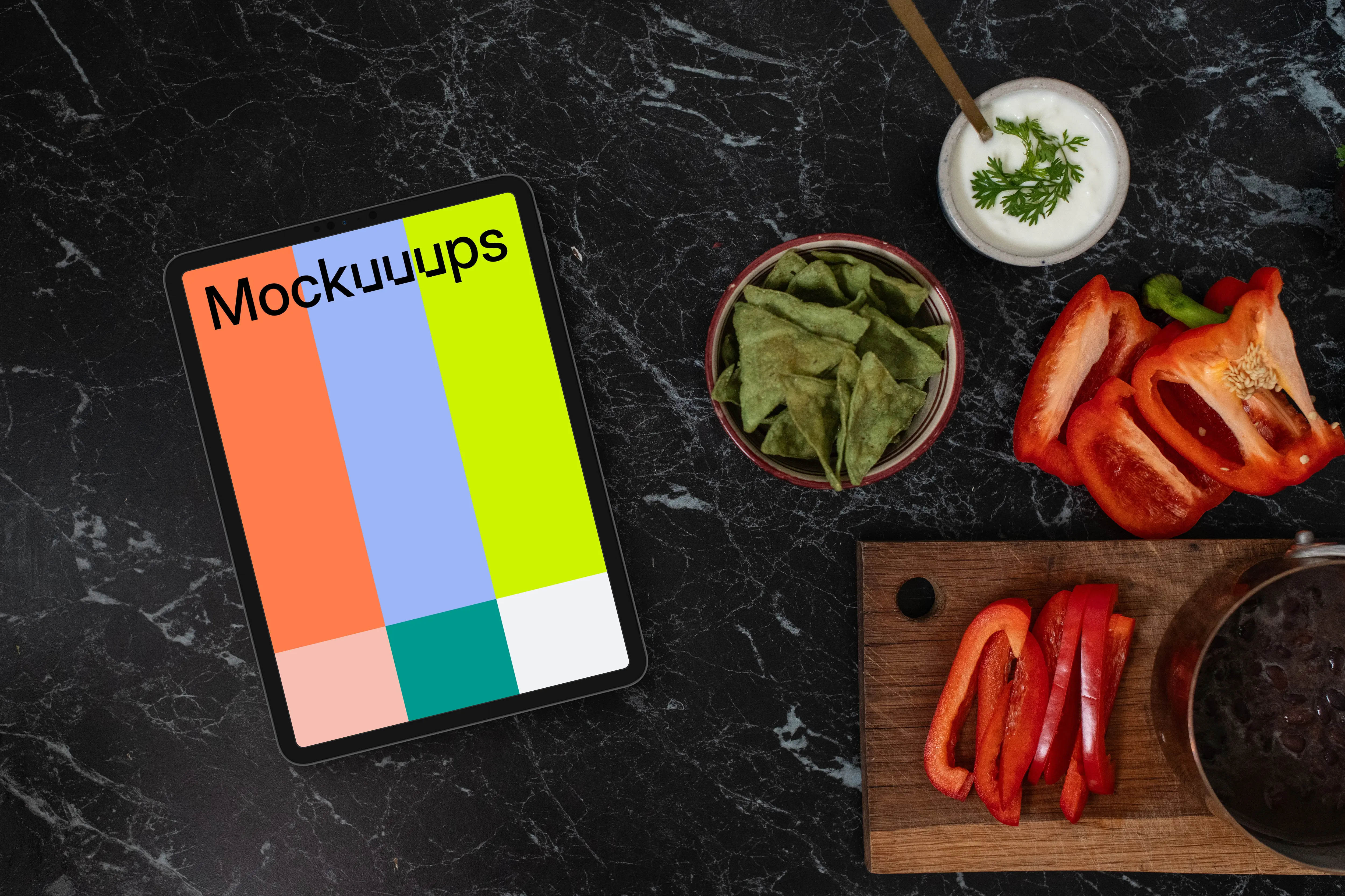 Tablet mockup on the marble kitchen unit