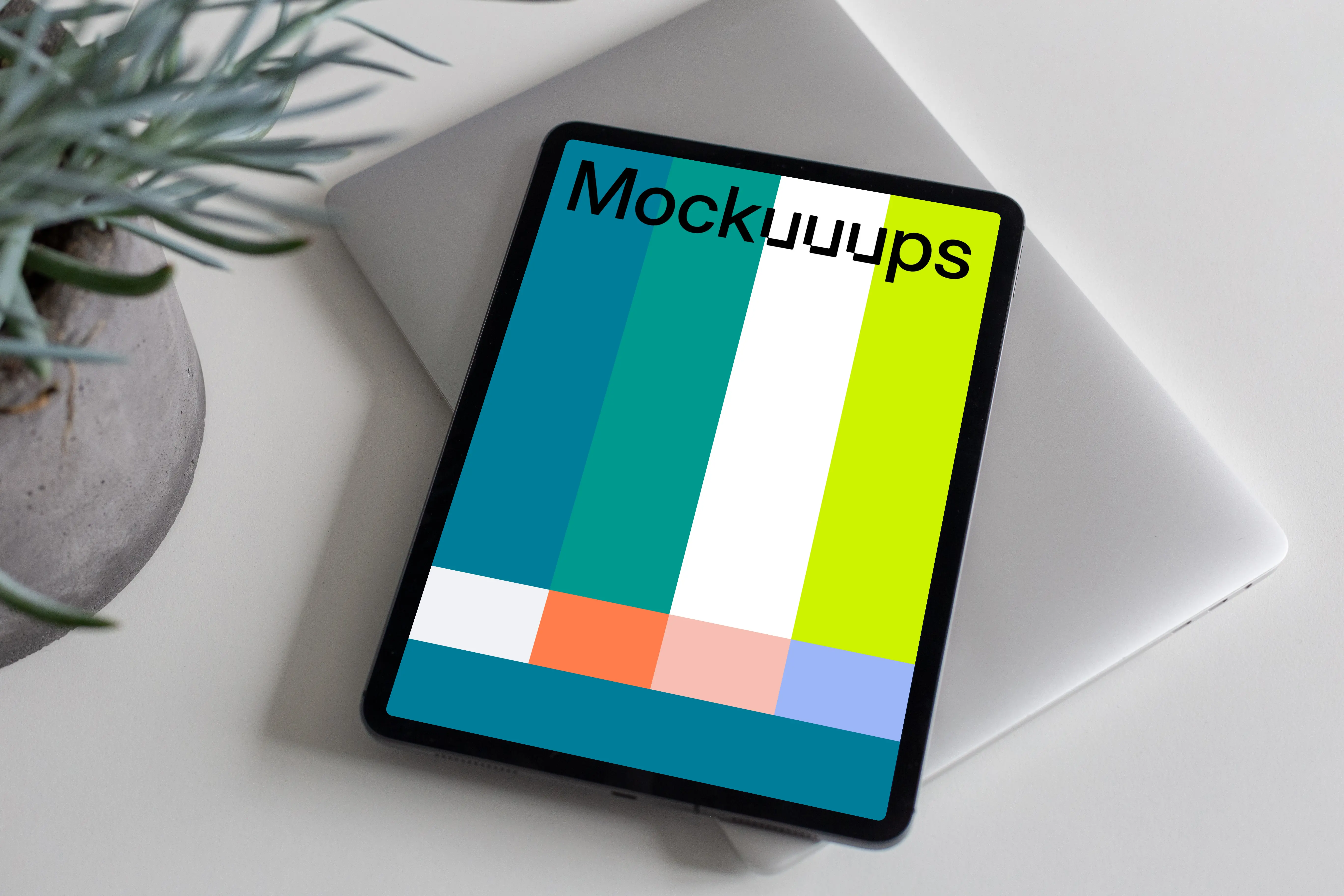 Tablet mockup on top of the MacBook