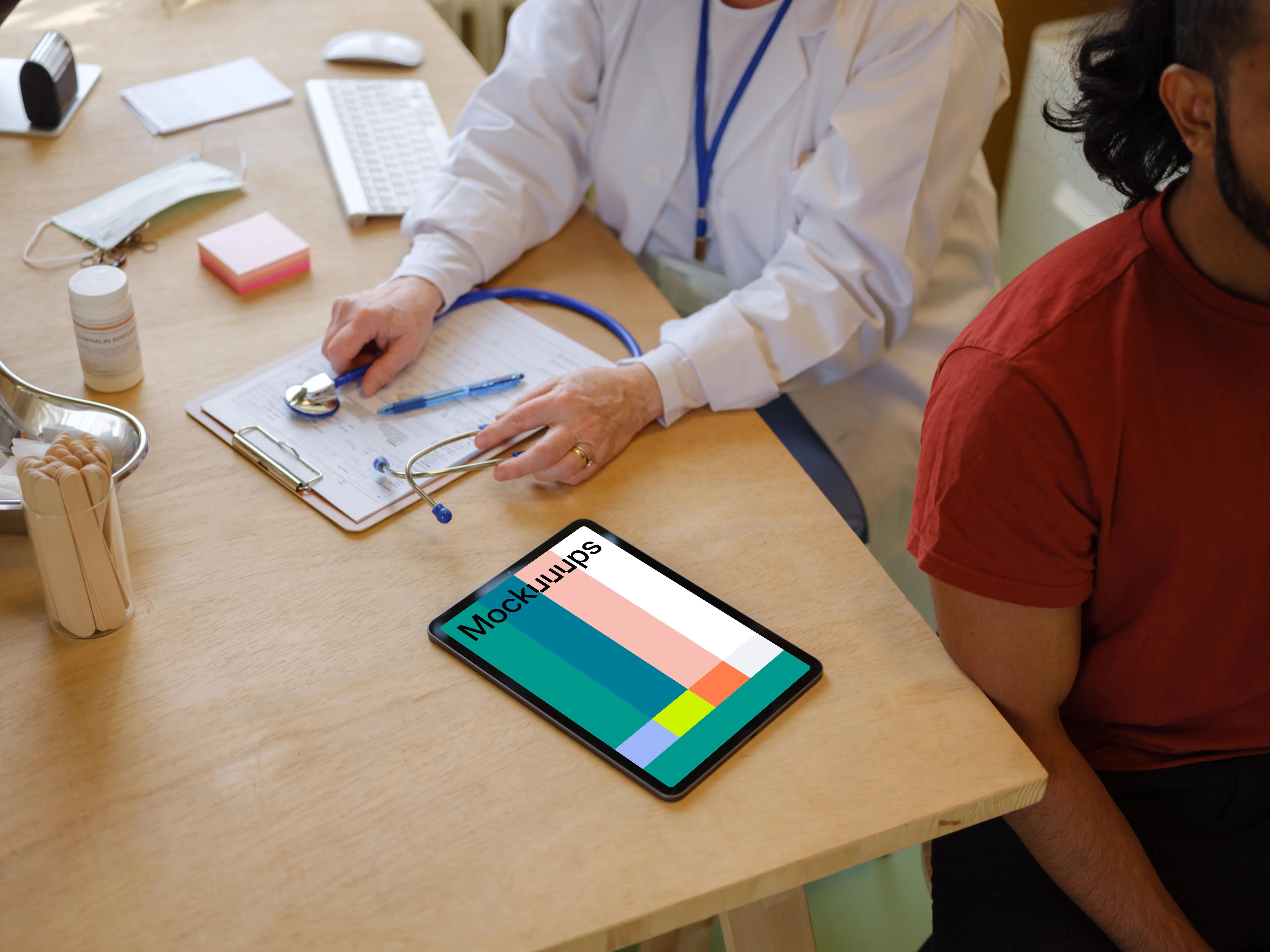 Tablet mockup placed on the doctor’s table