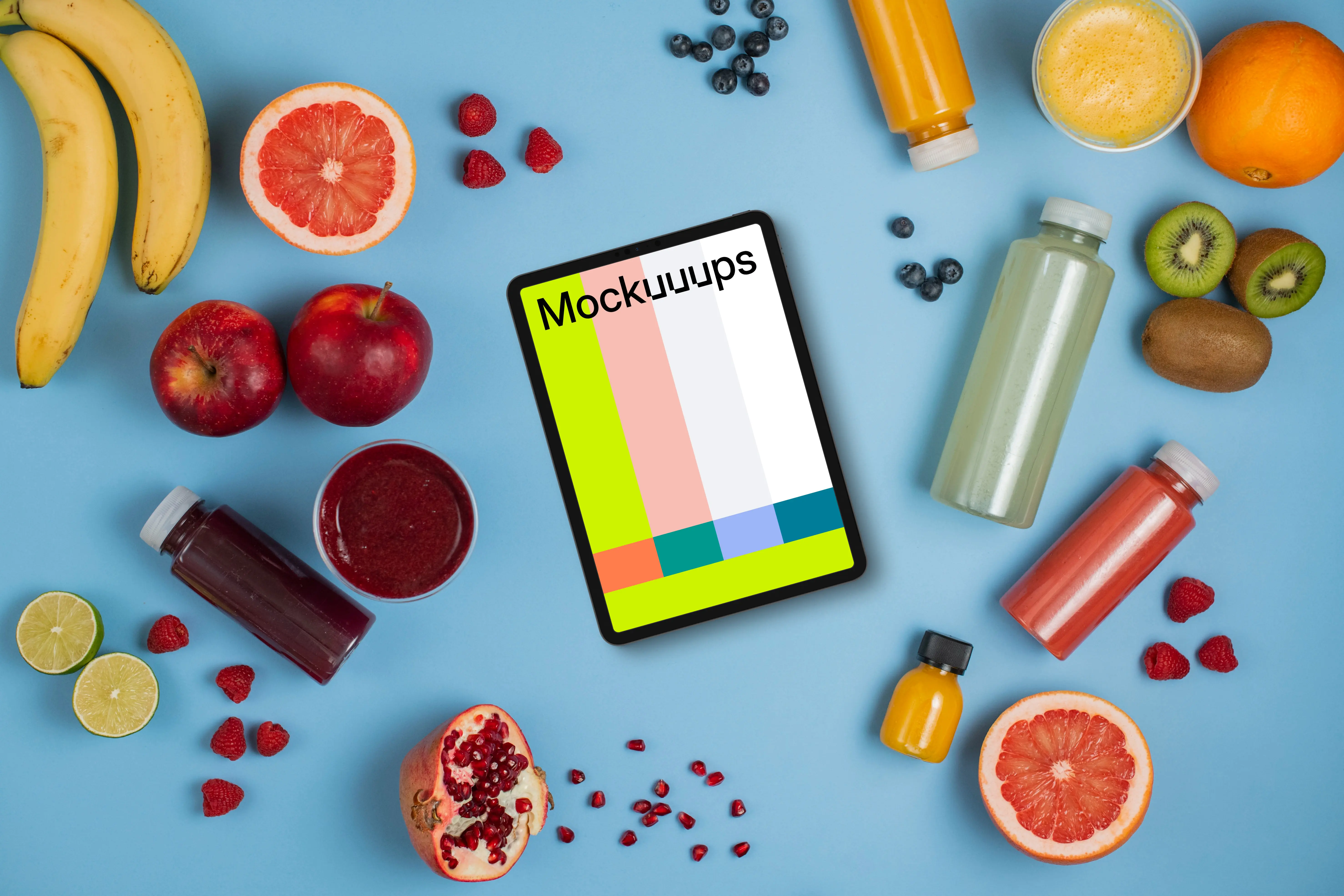 Tablet mockup surrounded by juices