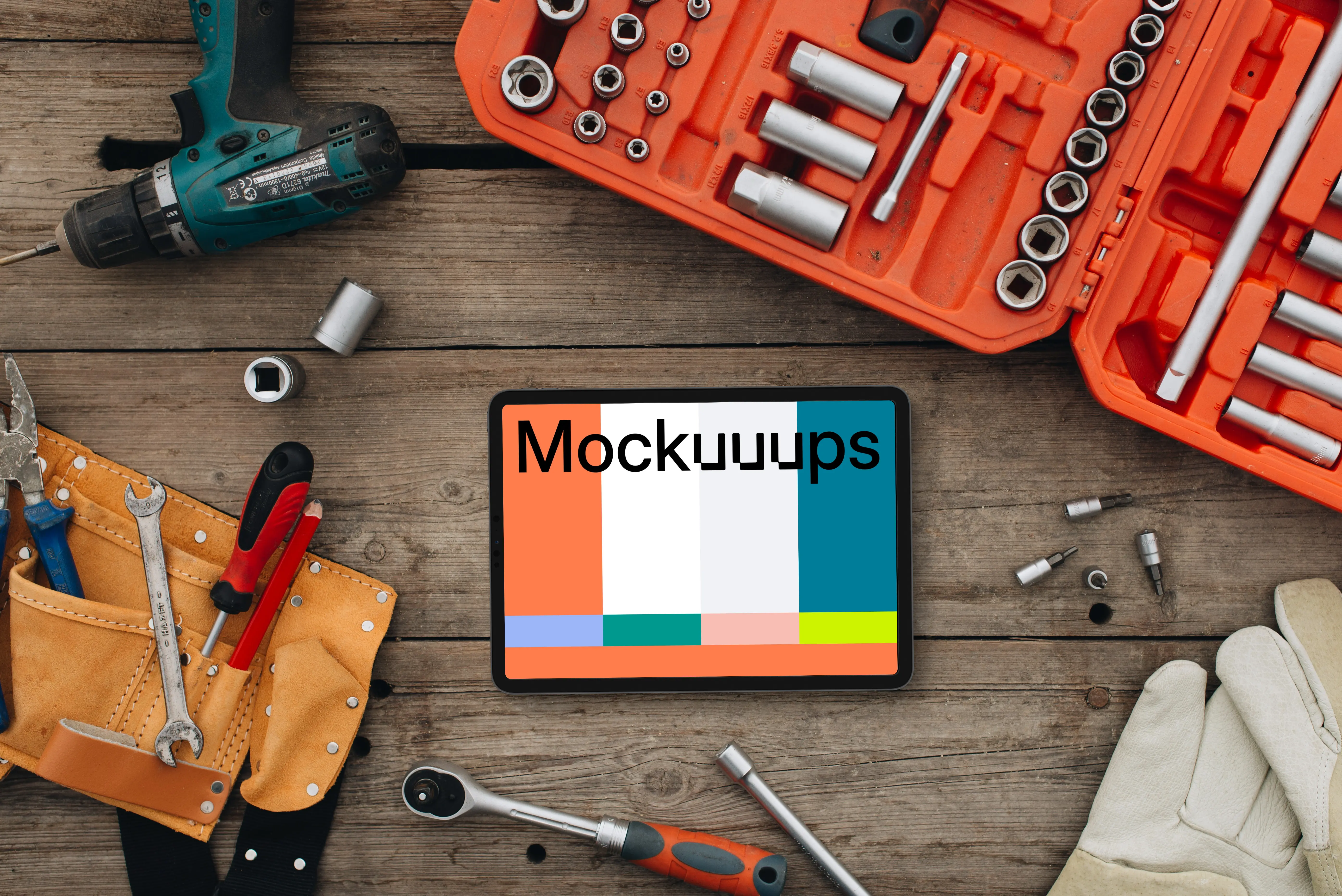Tablet mockup surrounded by workshop tools