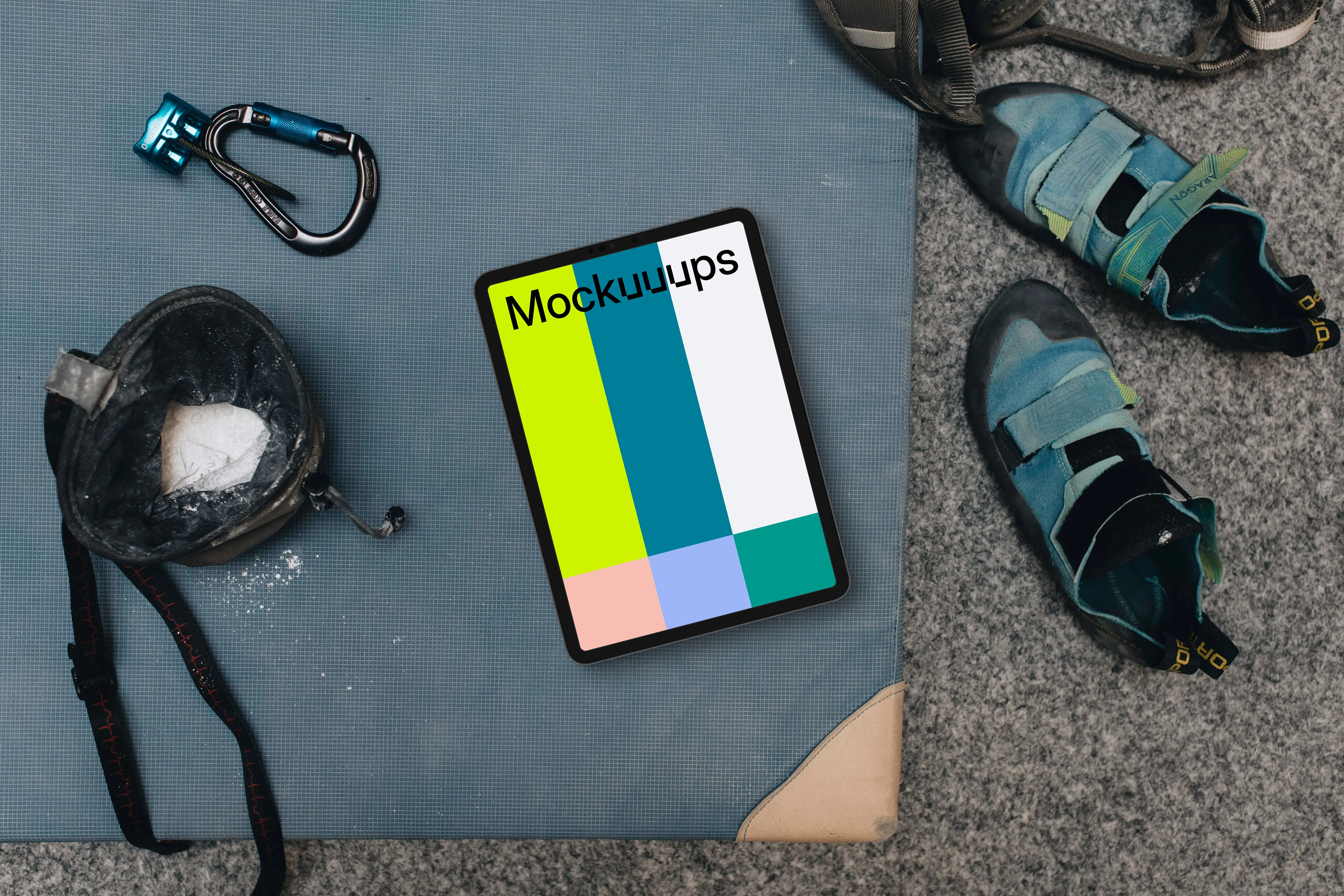 Tablet mockup with climbing equipment