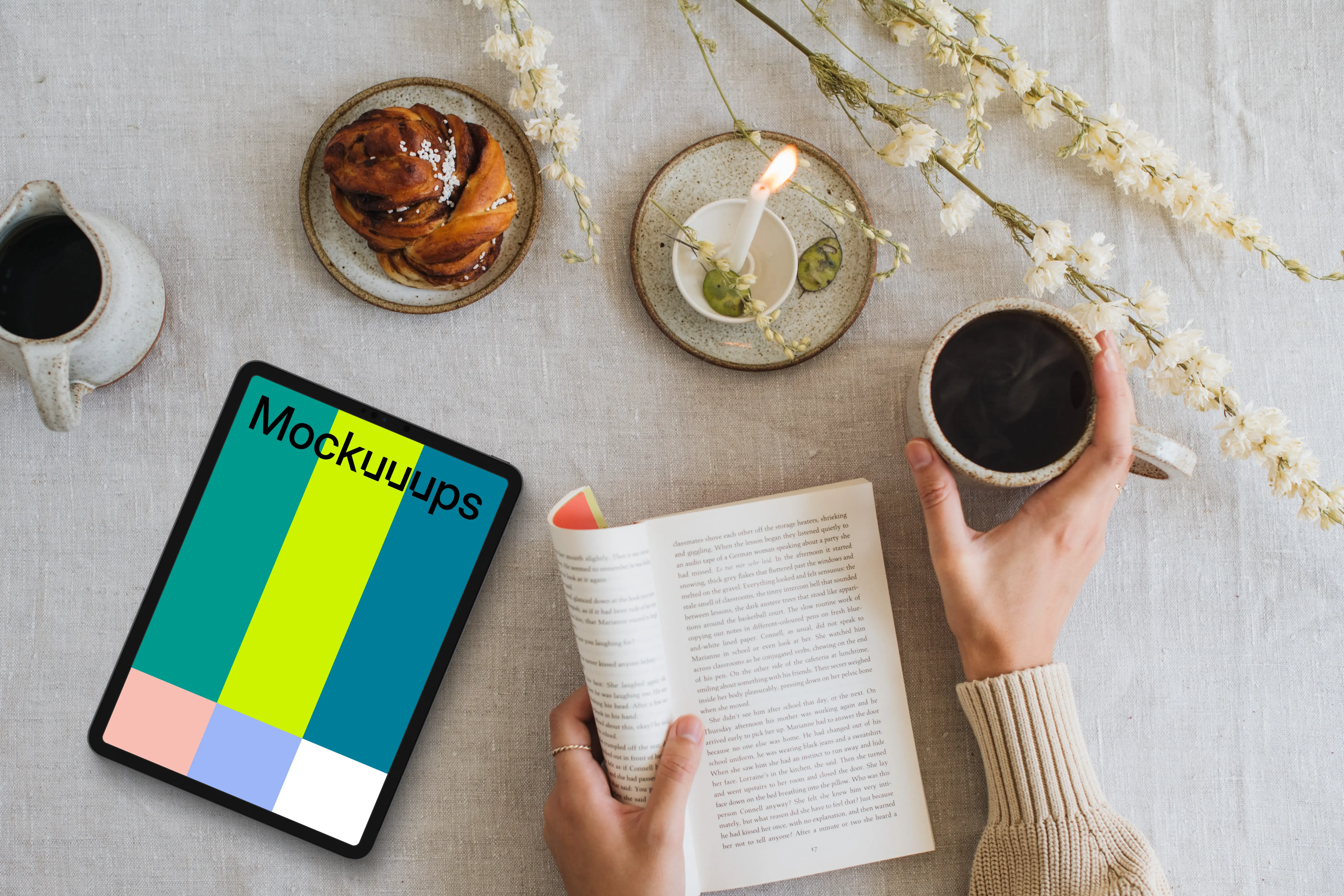 Tablet mockup with coffee and book on the table