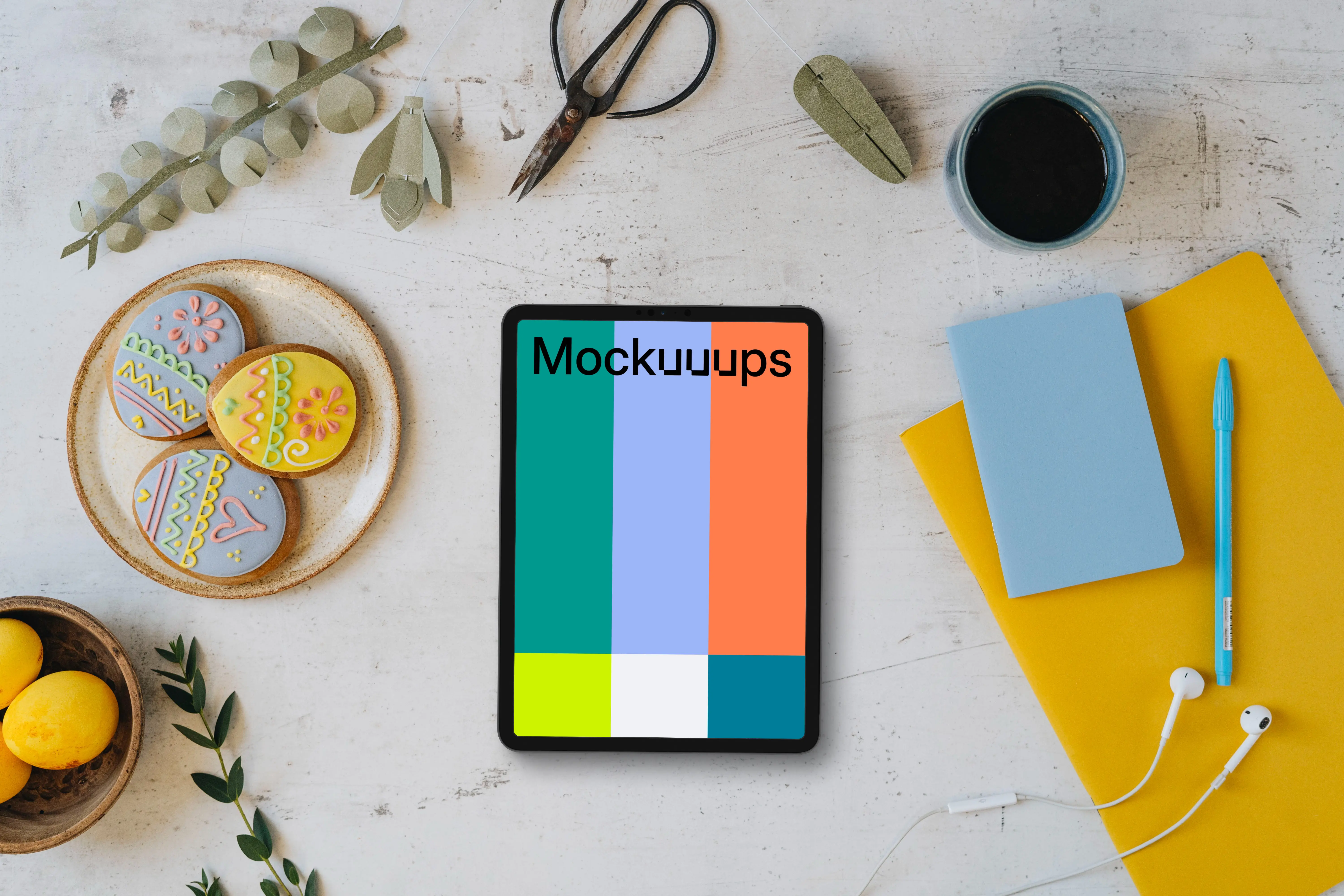 Tablet mockup with Easter gingerbreads and decorations