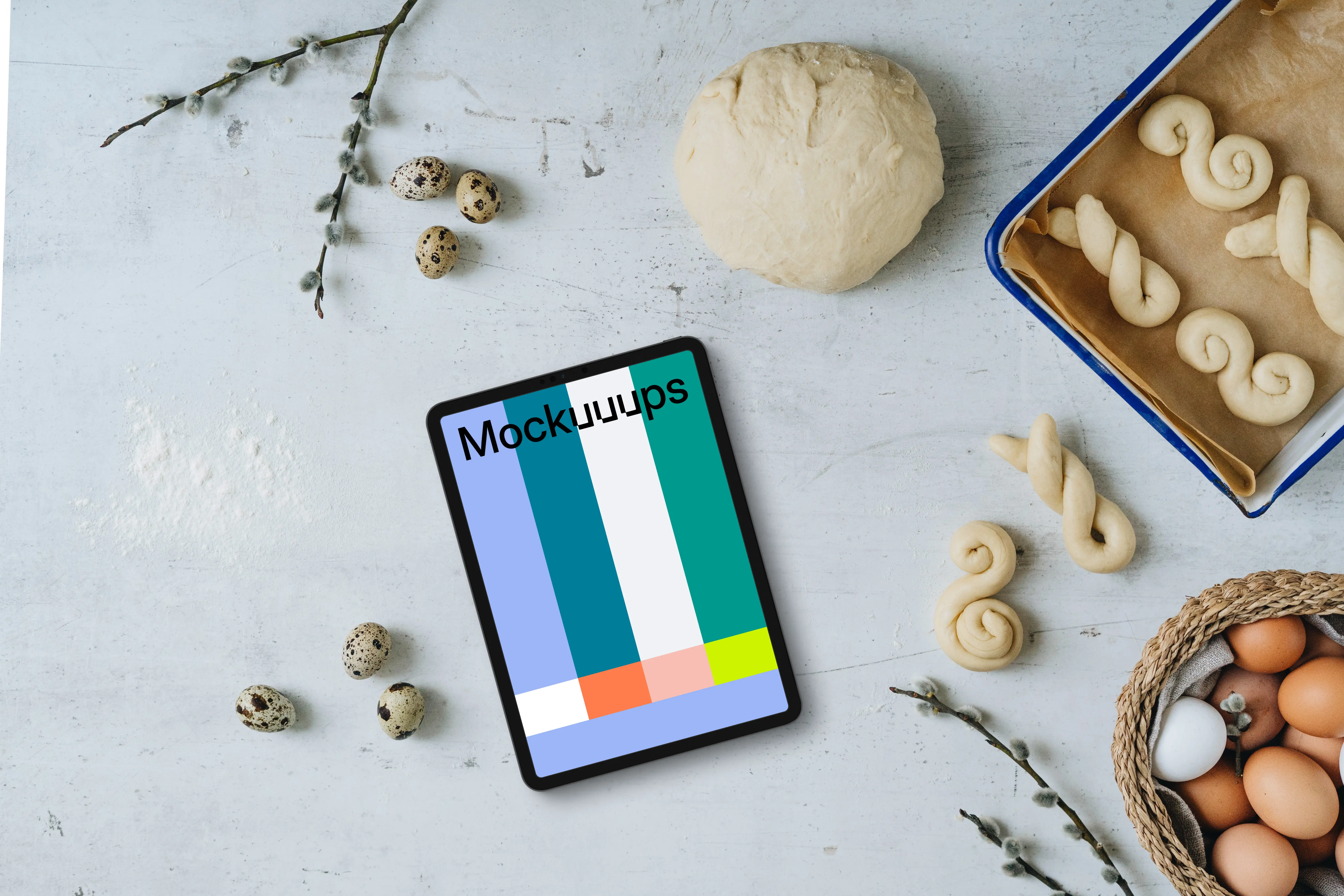 Tablet mockup with Easter pastries being made