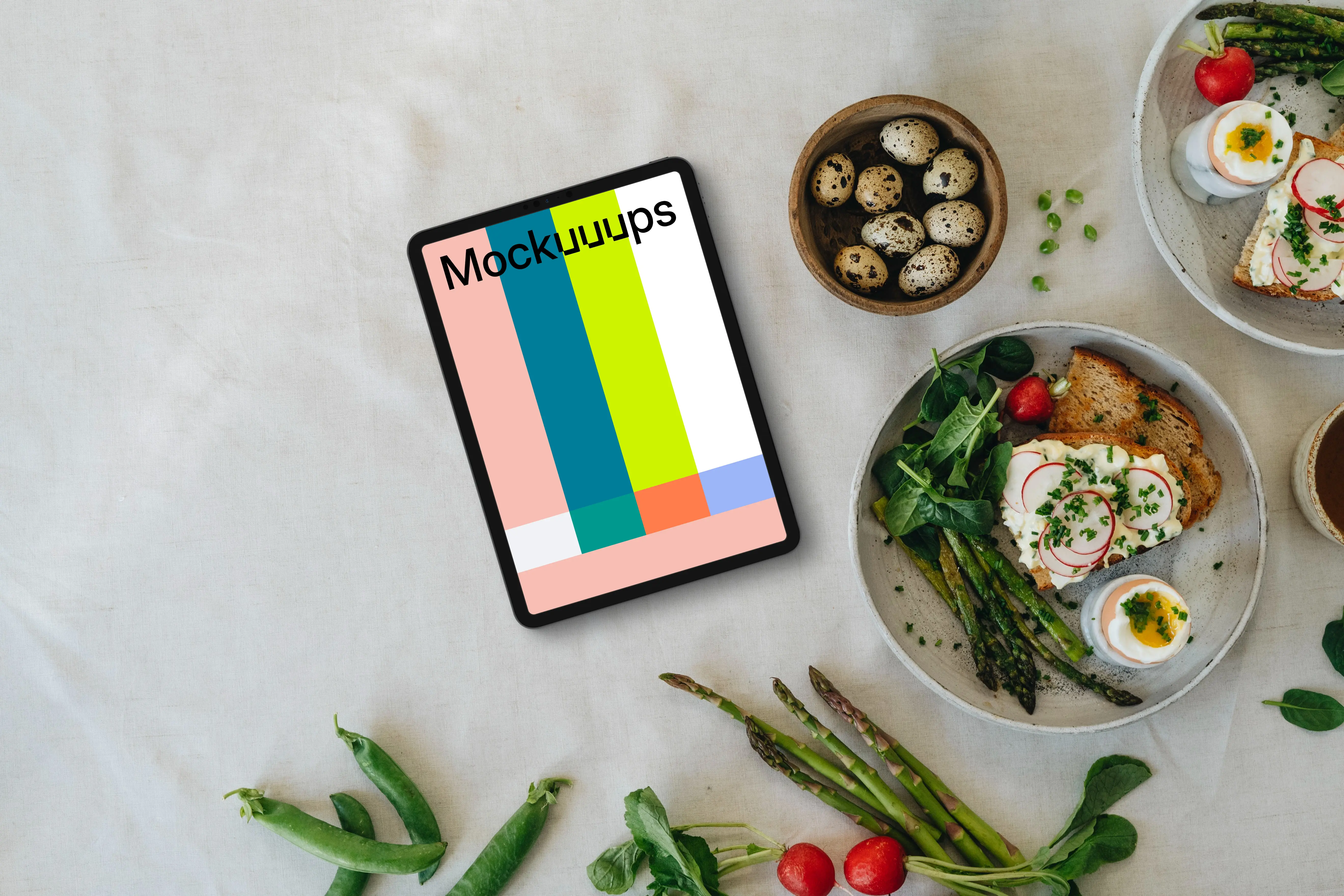 Tablet mockup with Easter snack and spring vegetables
