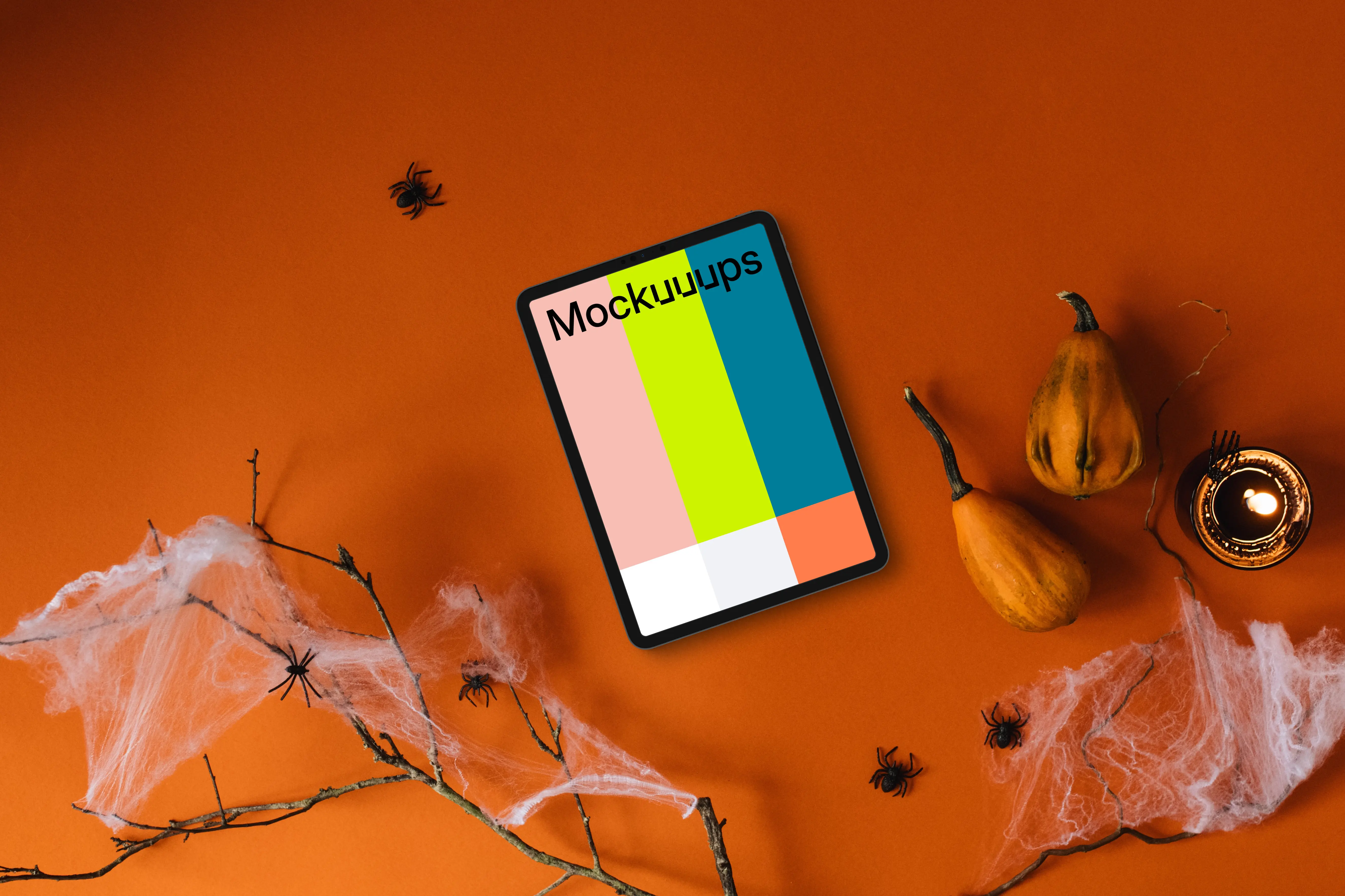 Top view of halloween presentation template with a tablet