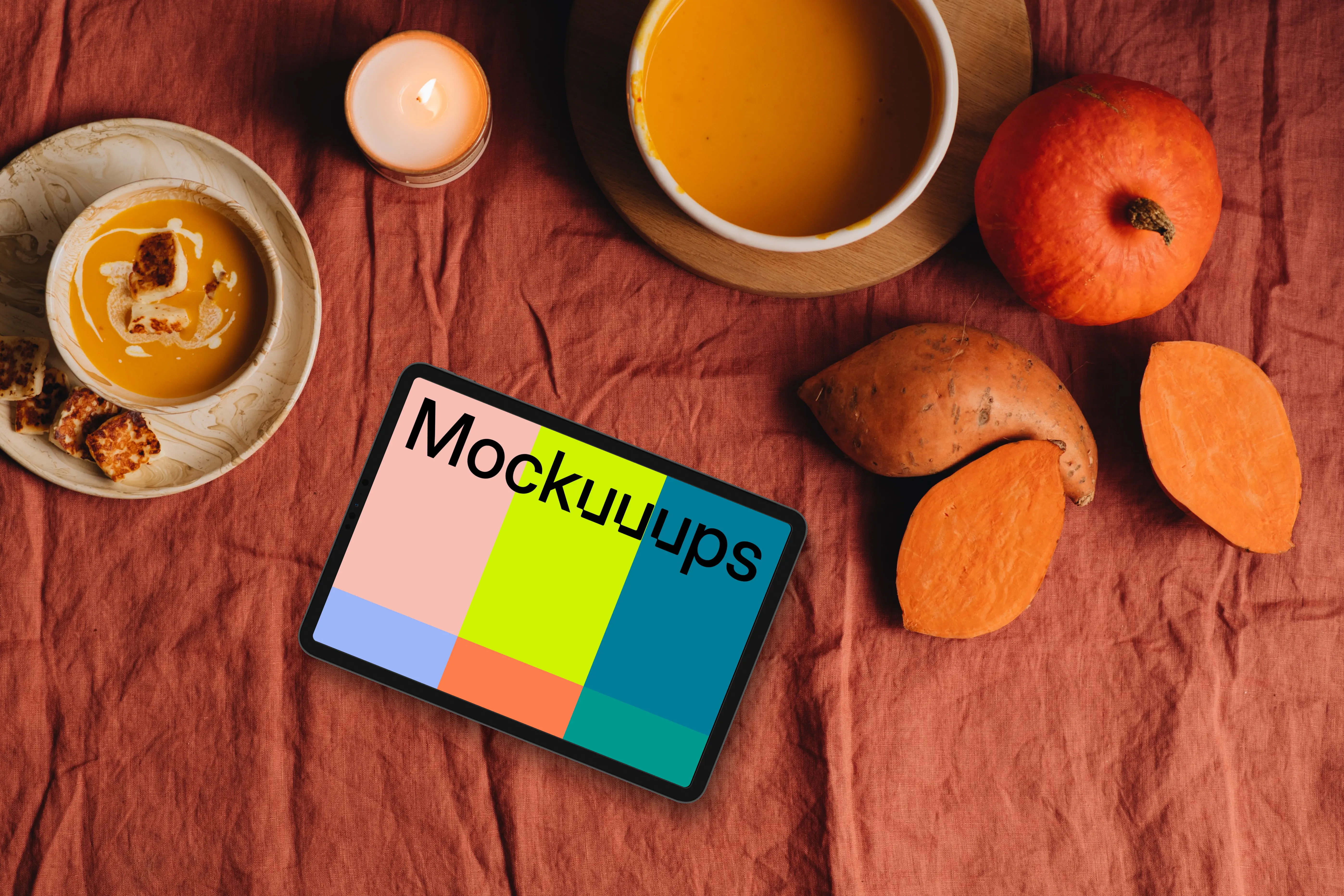 Top view of landscape tablet mockup next to pumpkins