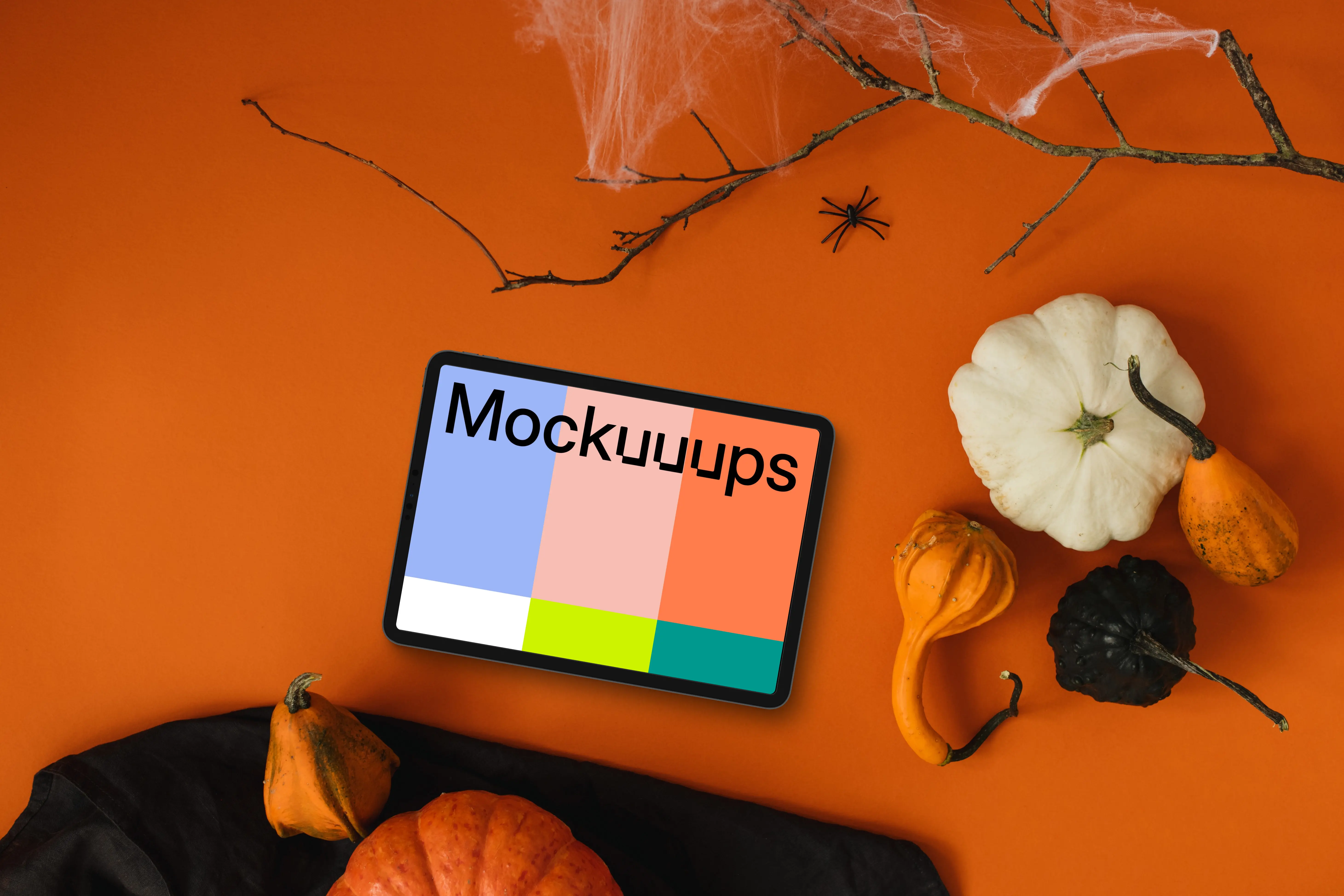 Top view of landscape tablet mockup with halloween decorations