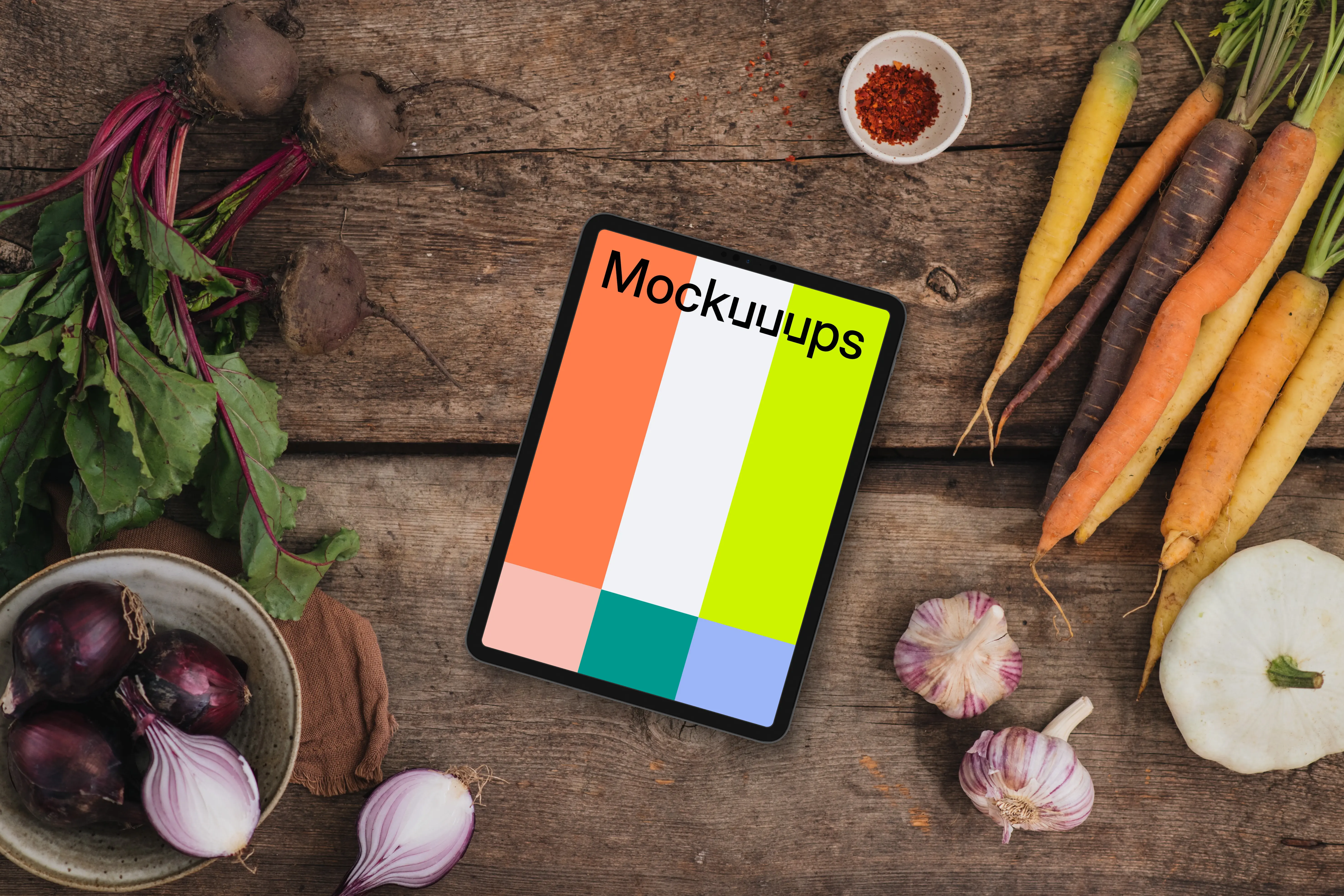 Top view of tablet mockup on wooden desk