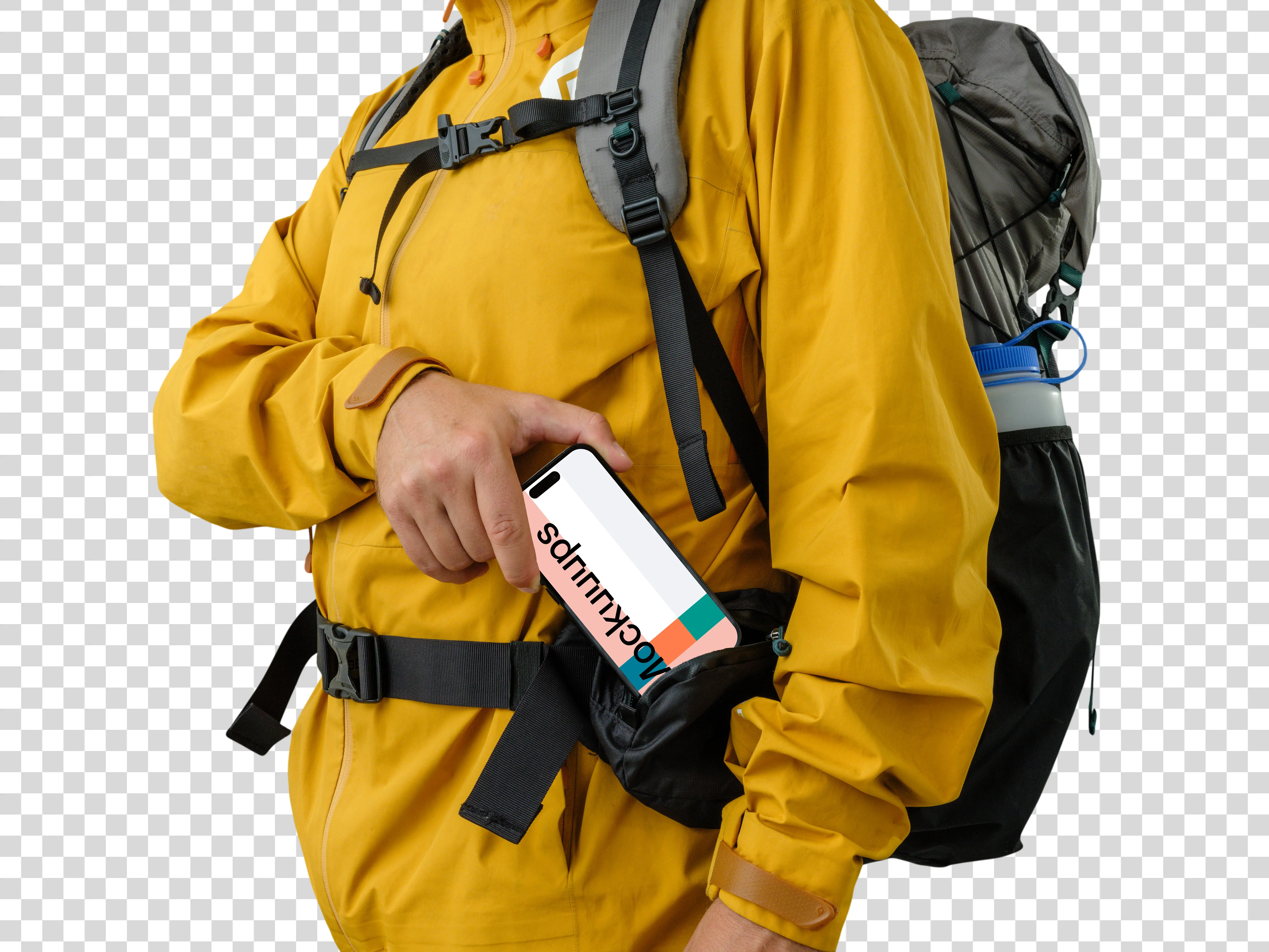 Tourist in yellow jacket with an iPhone mockup in hand