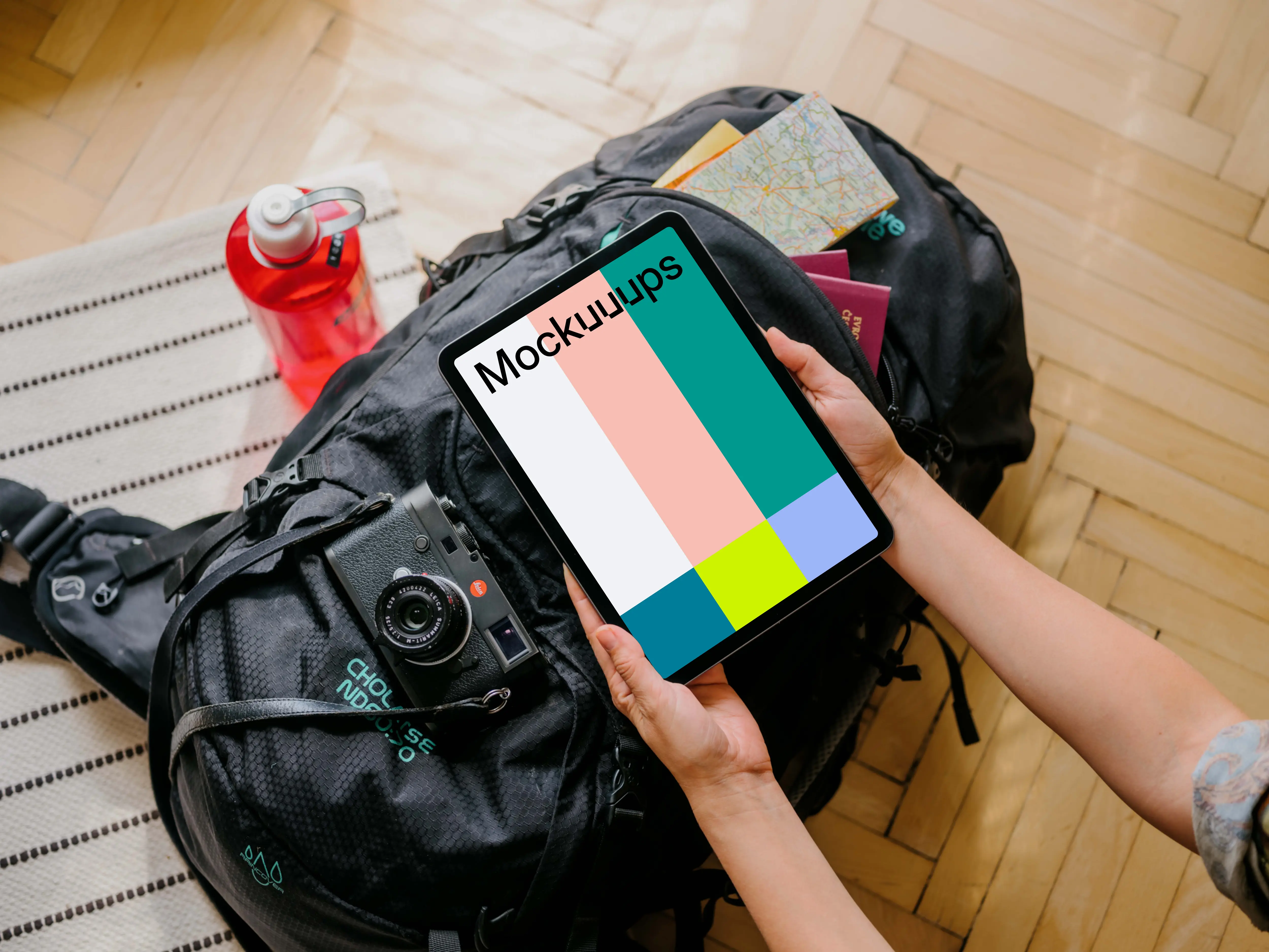 User holding a laptop mockup