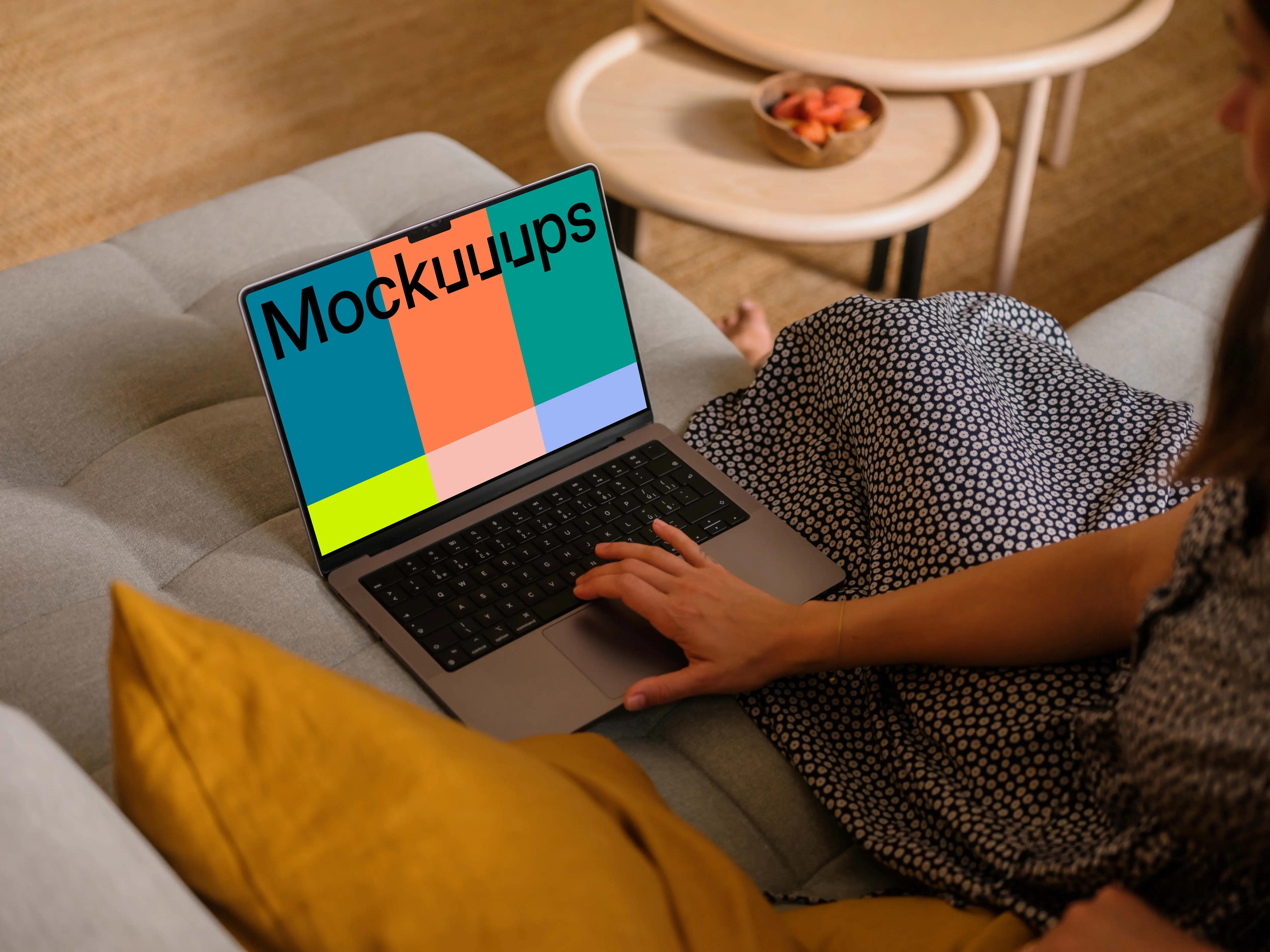 Woman hand scrolling on MacBook Pro mockup