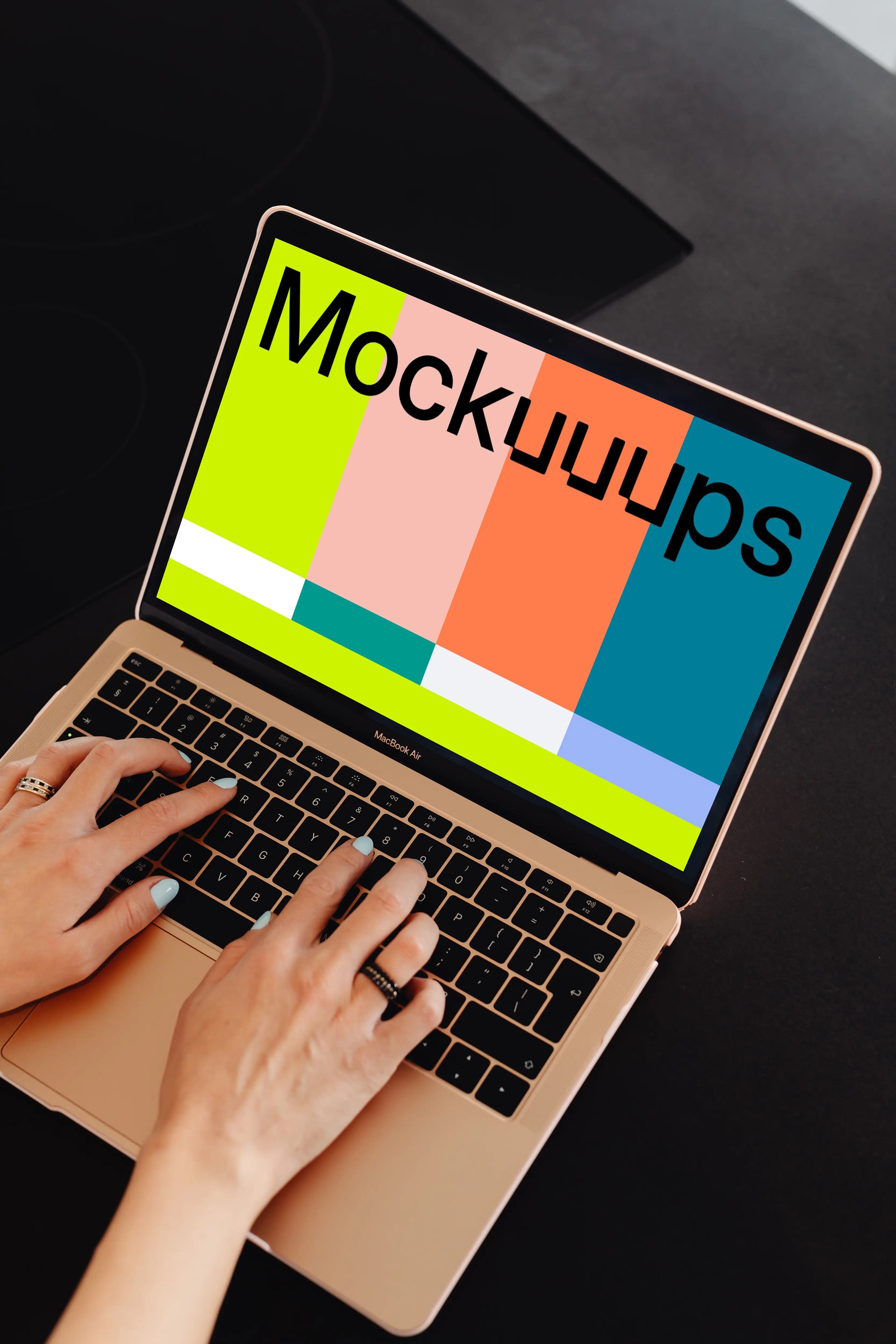 Woman hands typing on a MacBook Air mockup