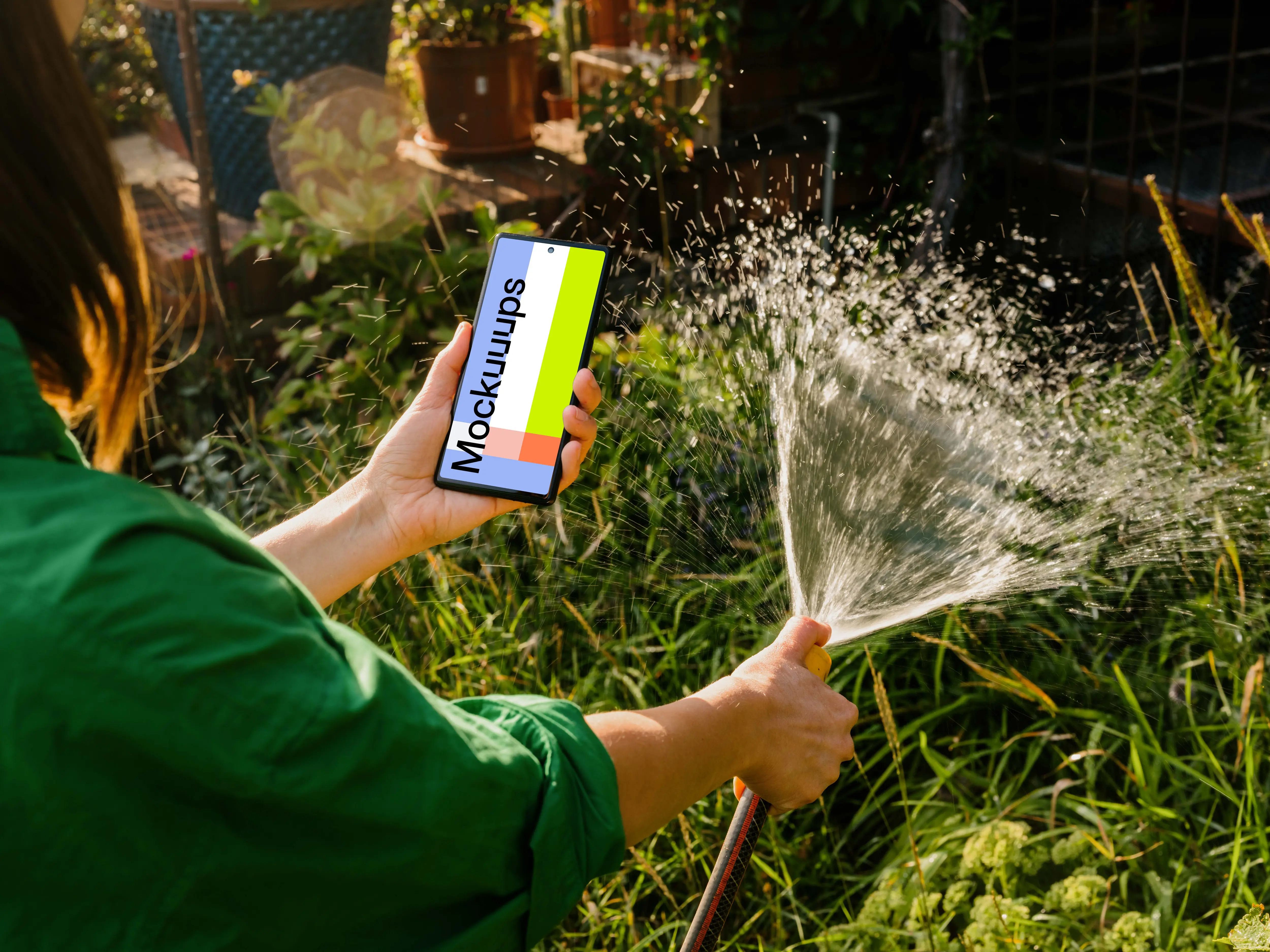 Woman holding a phone while watering grass mockup