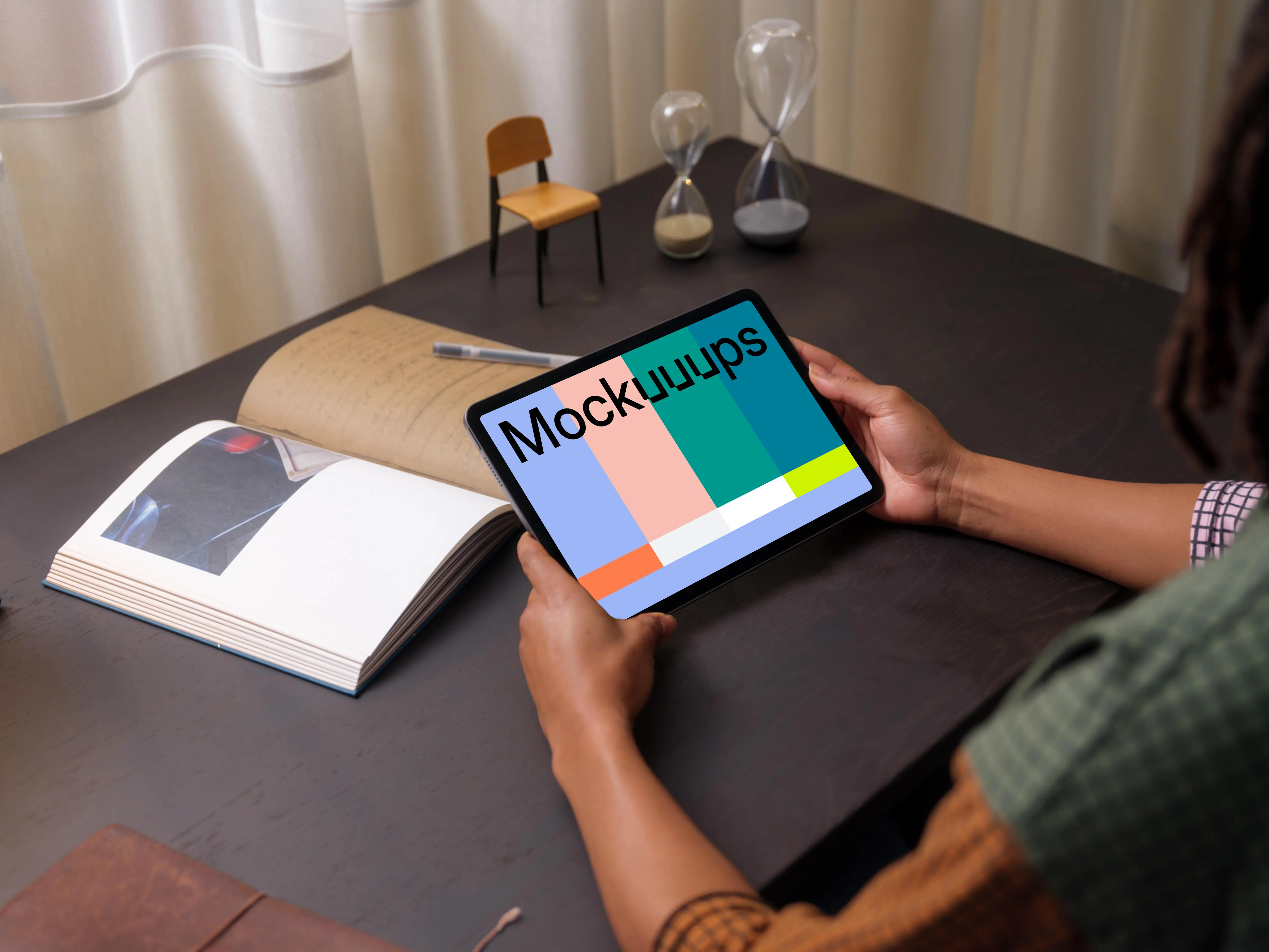 Woman holding an iPad Air mockup