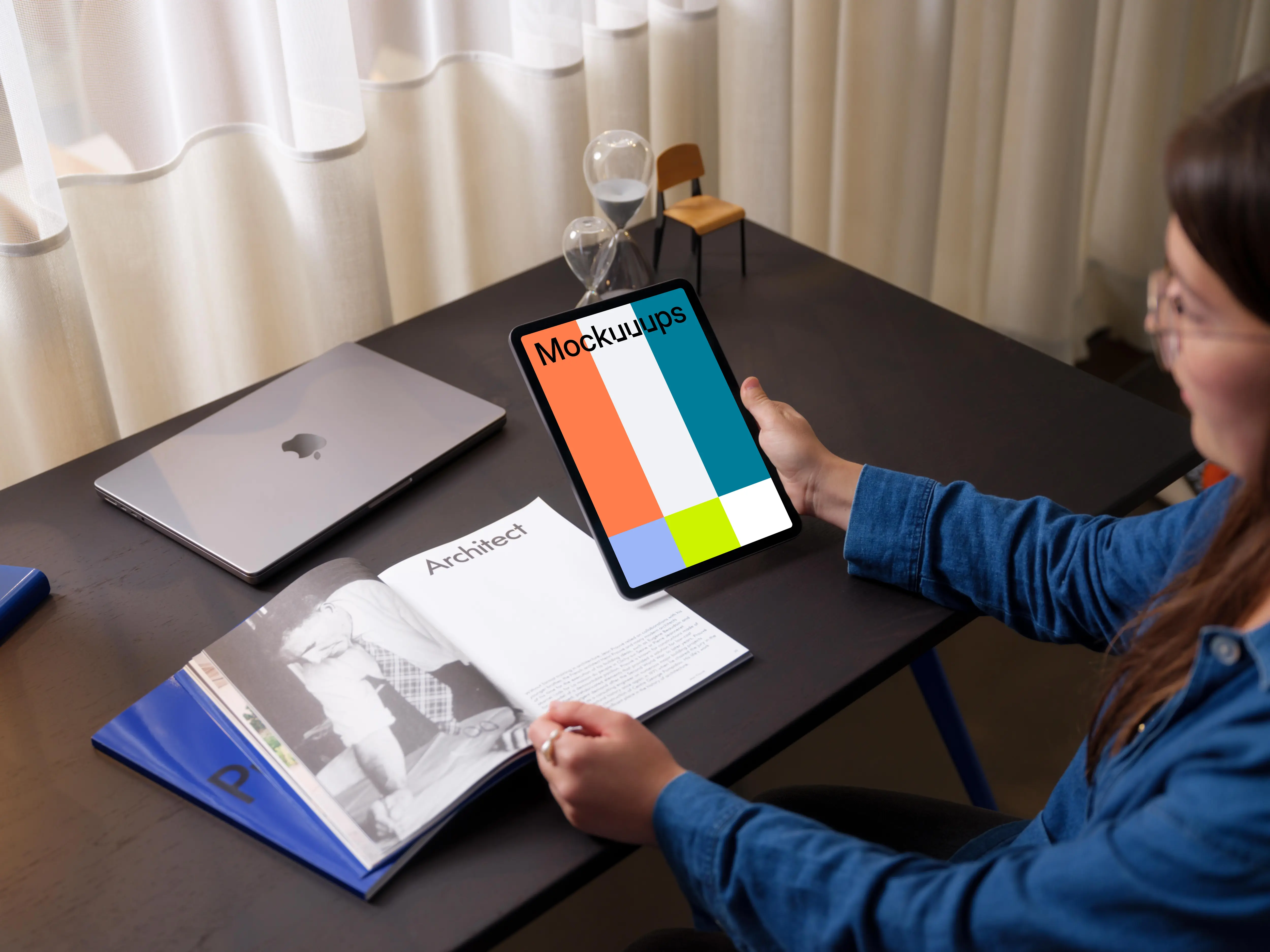 Woman holding an iPad Air mockup 