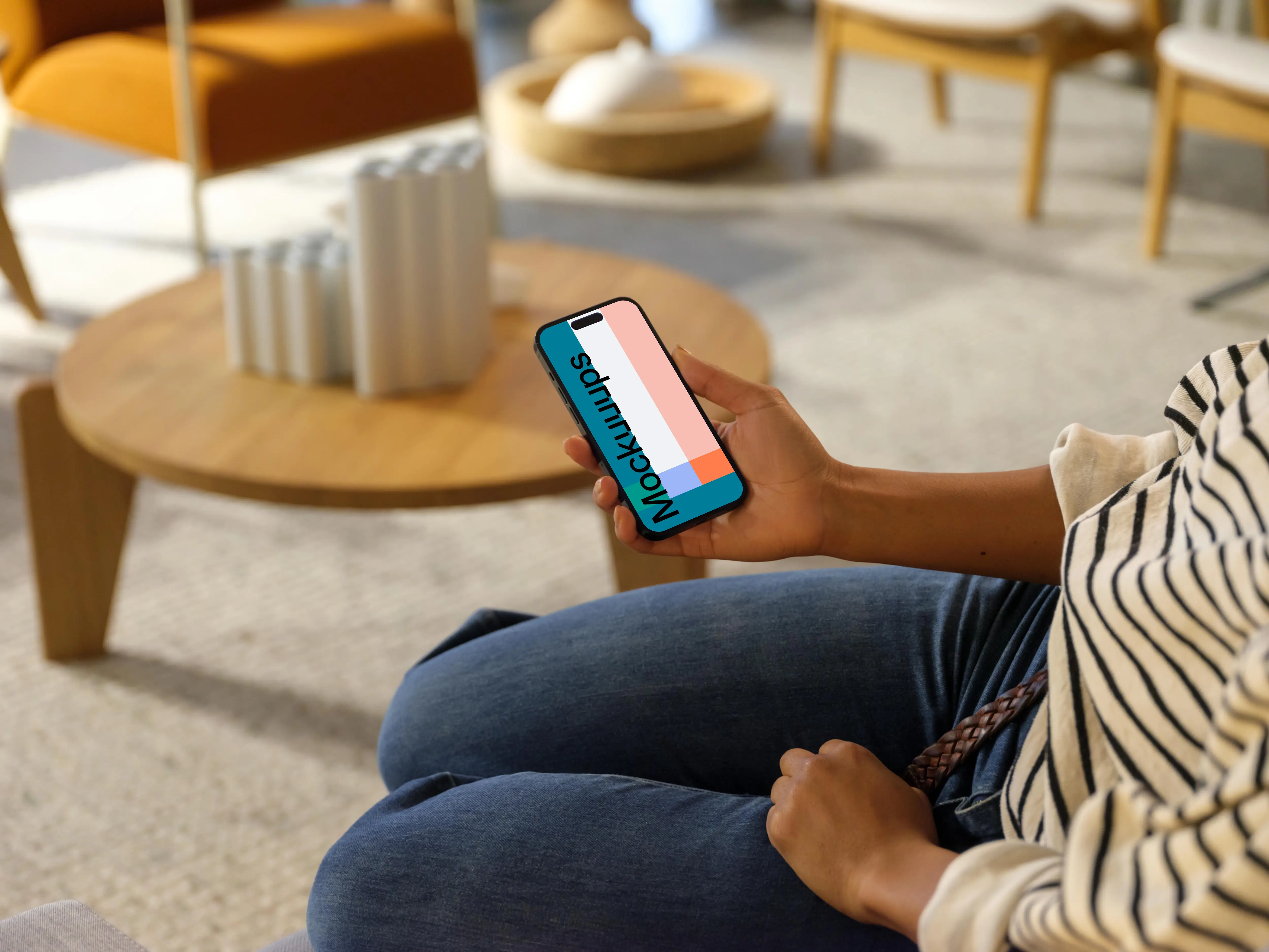 Woman holding an iPhone 14 Pro mockup