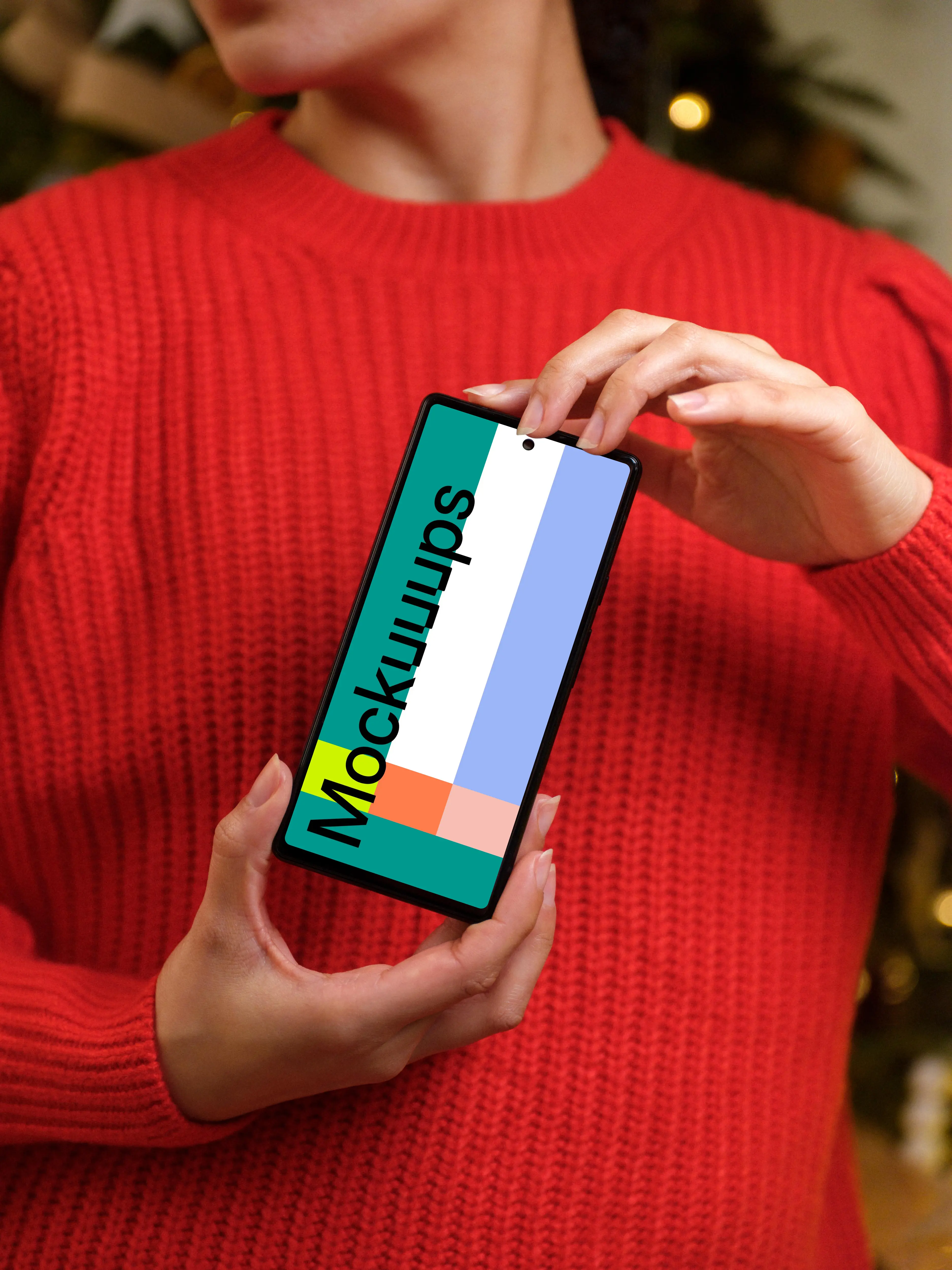 Woman in red sweater holding a Google Pixel 6 mockup