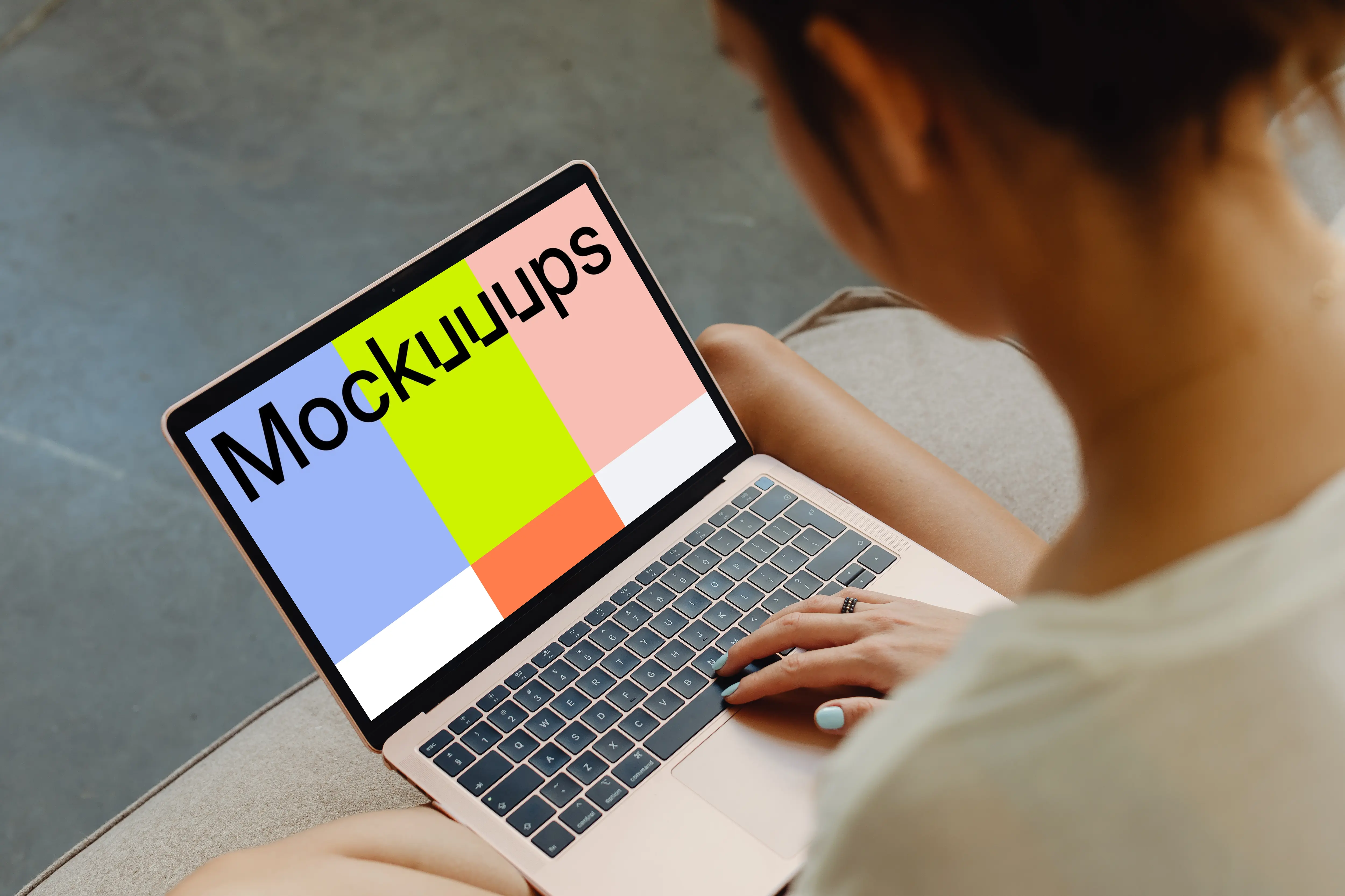 Woman working on a MacBook Air mockup