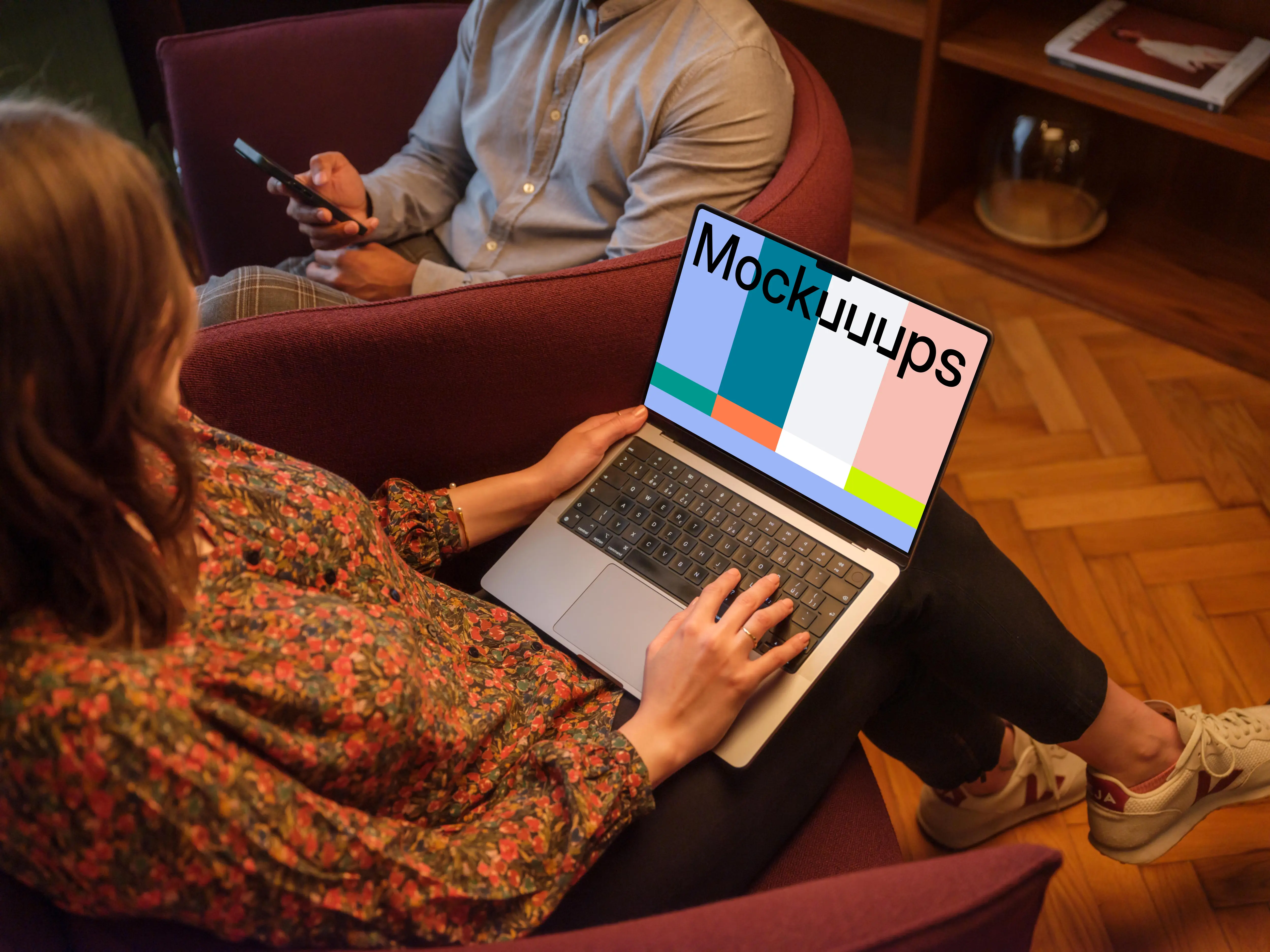 Woman working on a MacBook Pro 14 mockup in the office