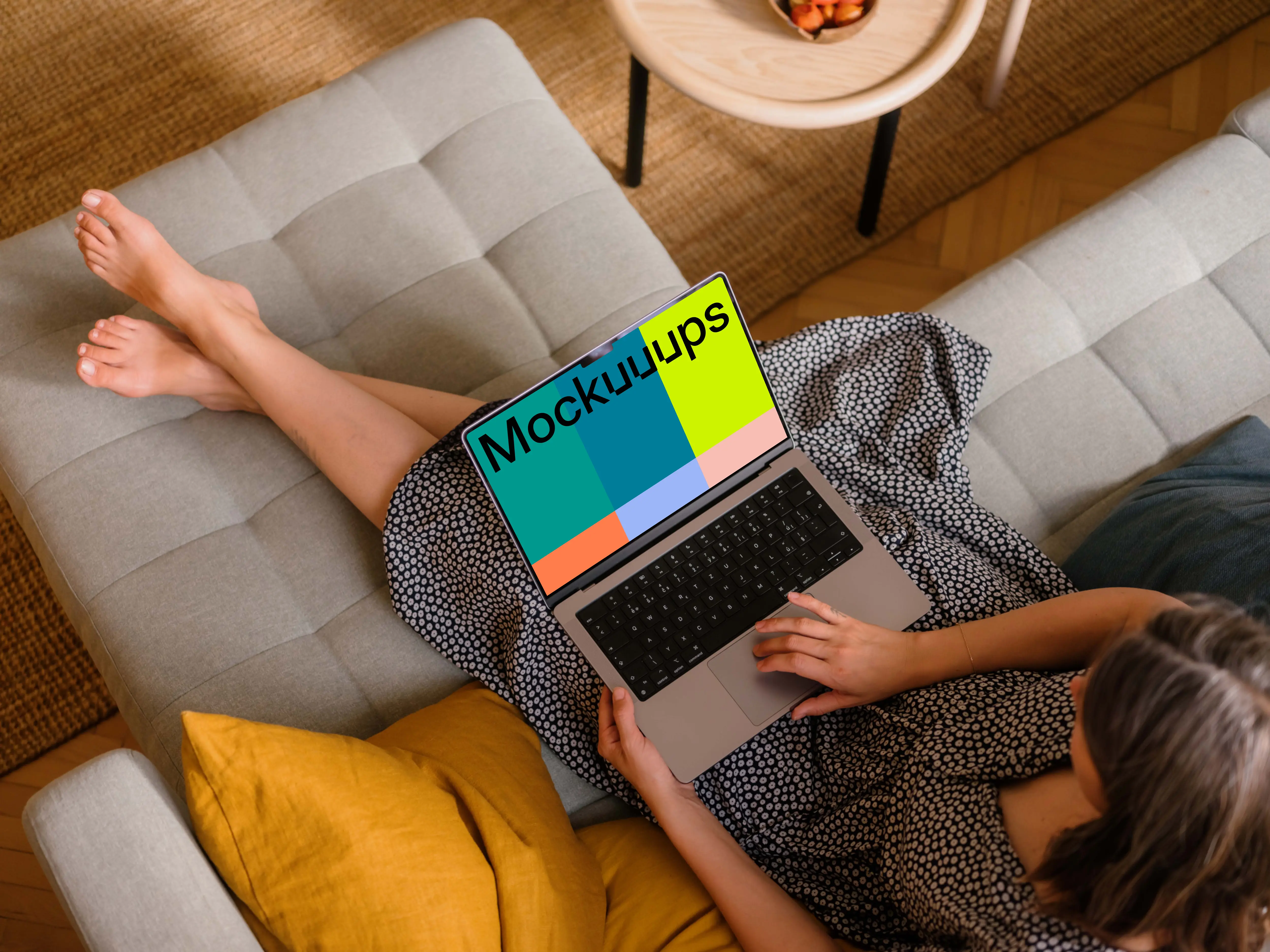 Woman working on a MacBook pro 14 mockup