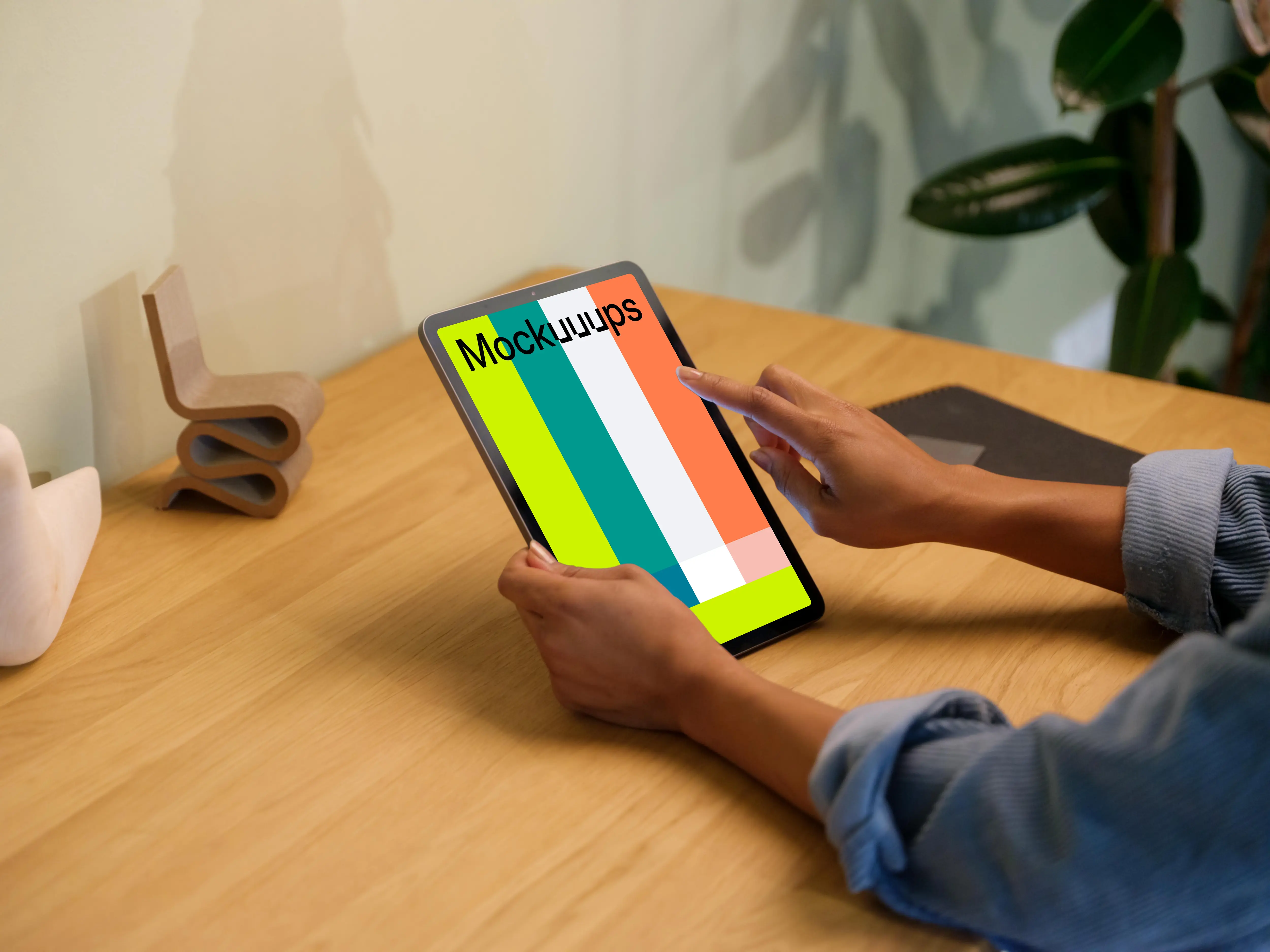 Woman working on an iPad Air mockup