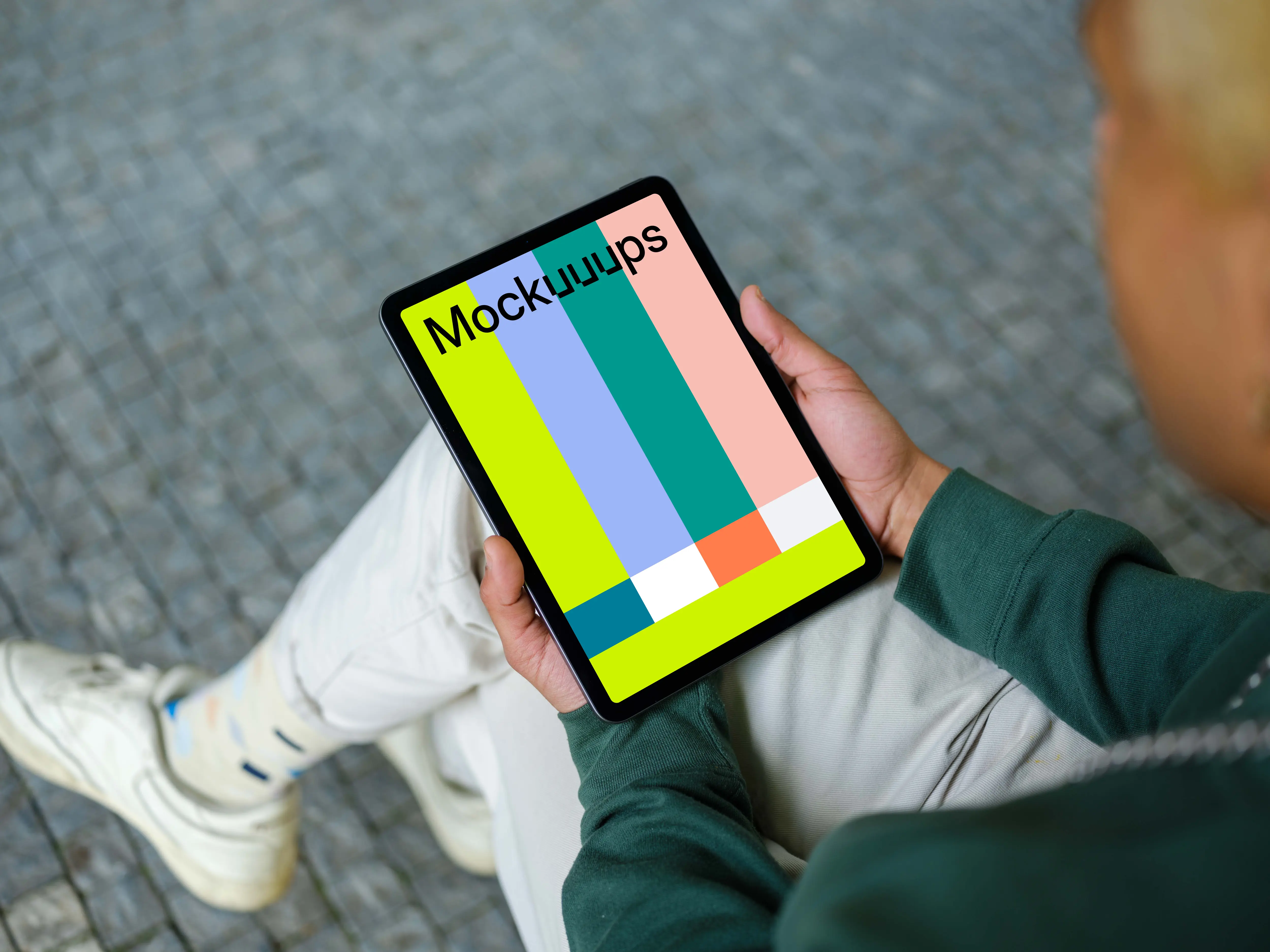 Young man reading on tablet mockup